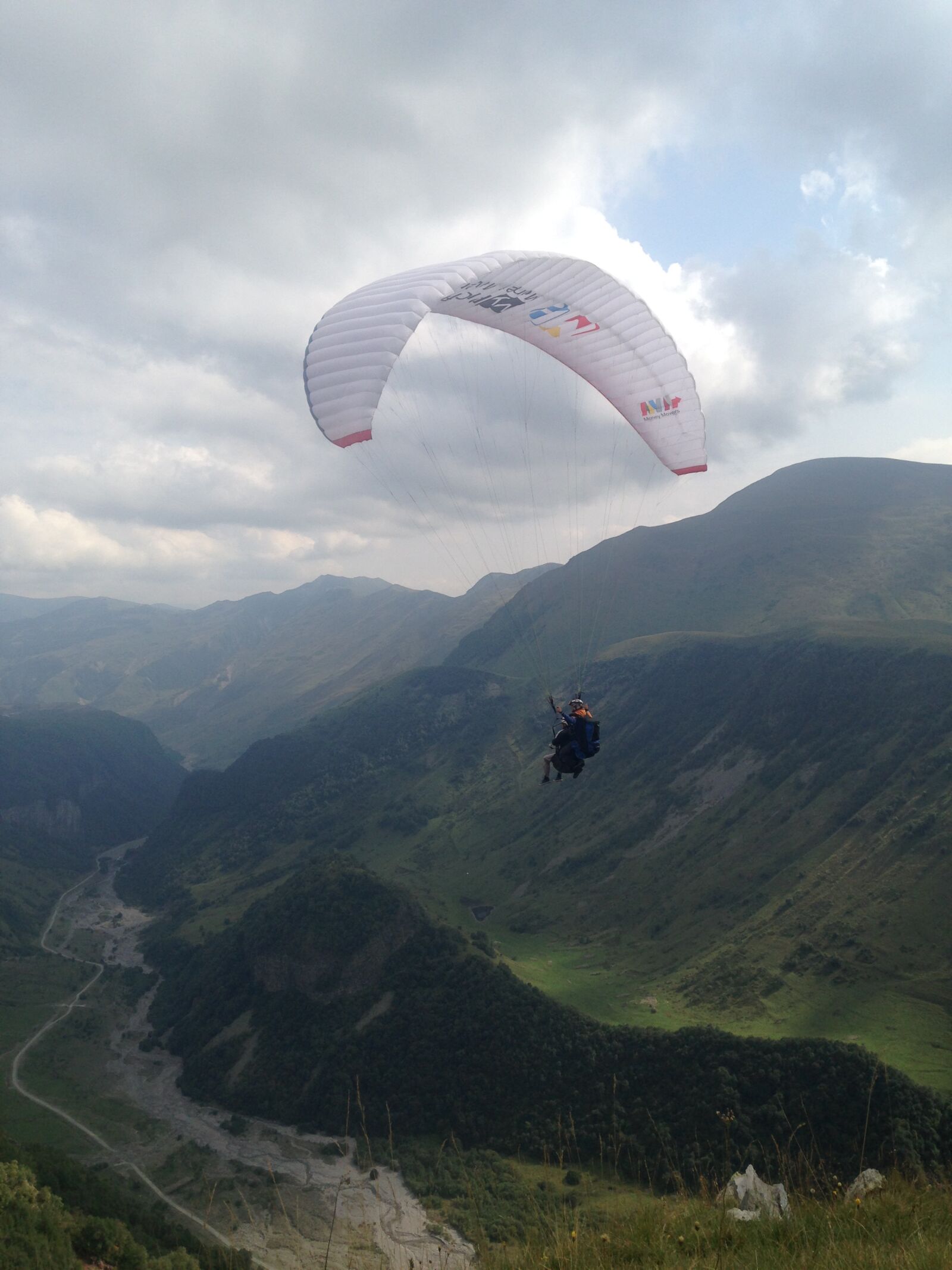 Apple iPhone 5c sample photo. Paraglider, flight, mountains photography
