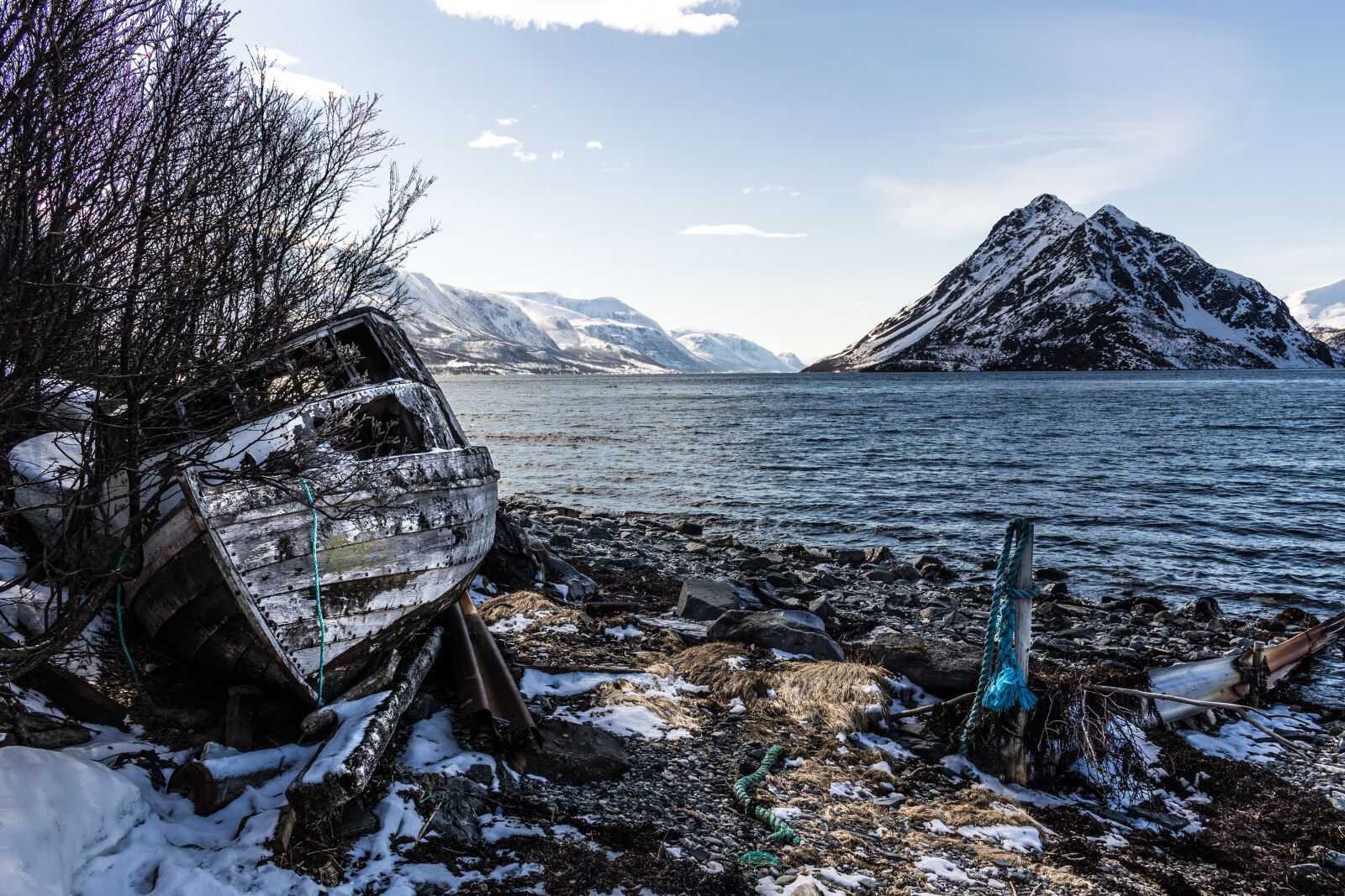 Canon EOS 100D (EOS Rebel SL1 / EOS Kiss X7) sample photo. Old boat, shoreline, fjord photography