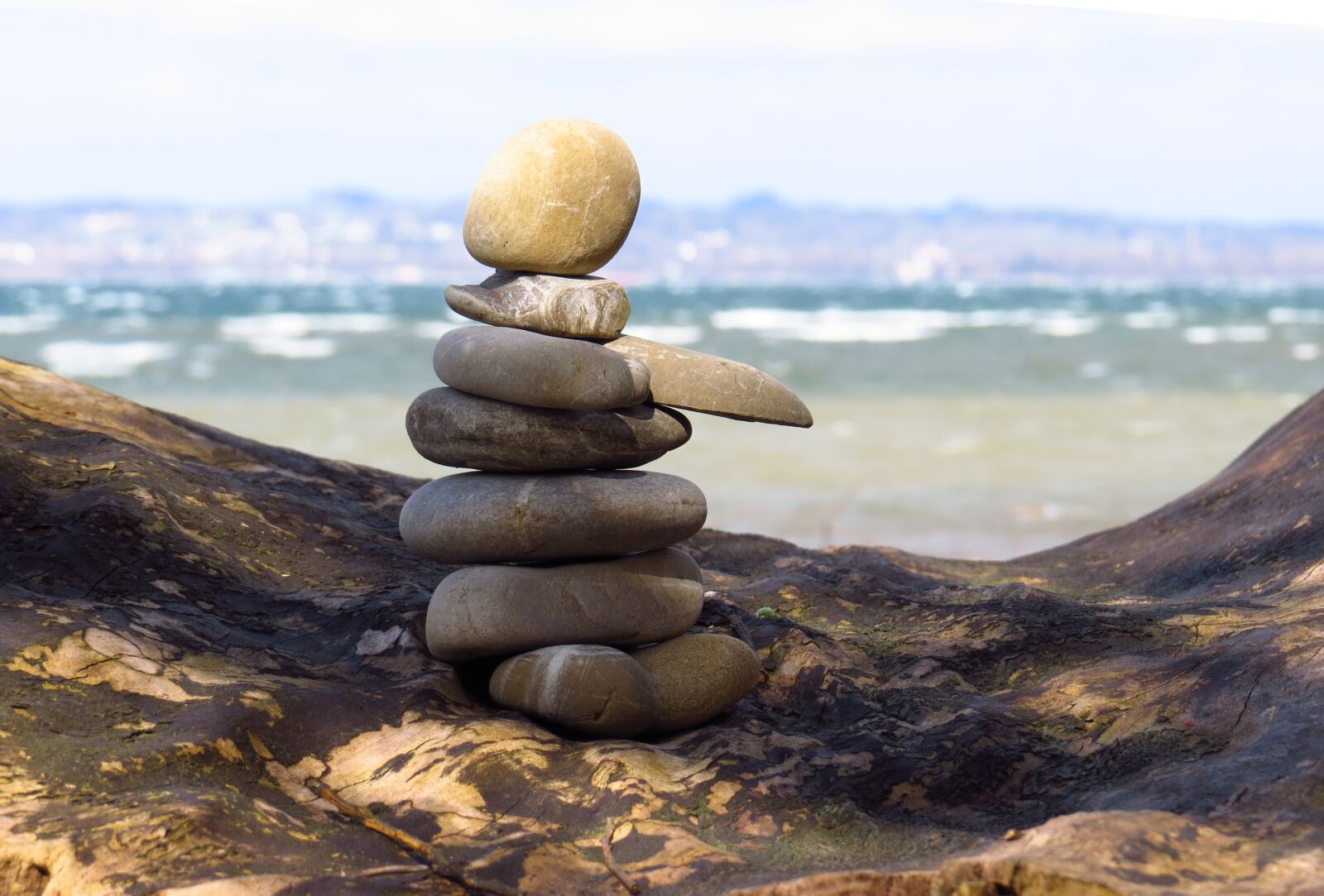 Canon PowerShot SX50 HS sample photo. Stones, lake, blue photography