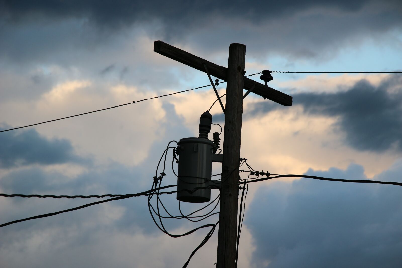 Canon EF-S 18-135mm F3.5-5.6 IS USM sample photo. Power pole, clouds, electricity photography
