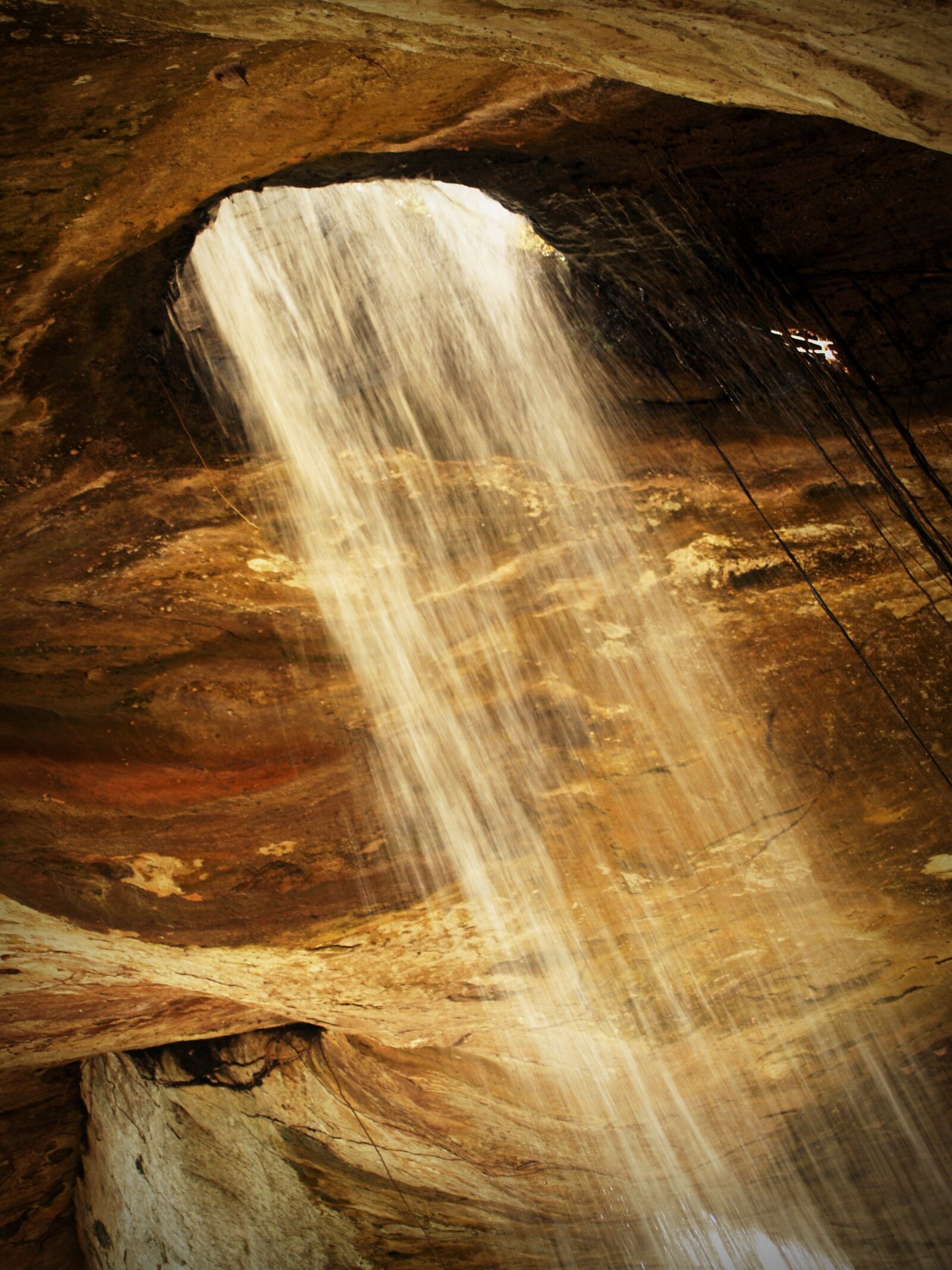 Olympus E-300 (EVOLT E-300) sample photo. Cave, dark, daylight, erosion photography