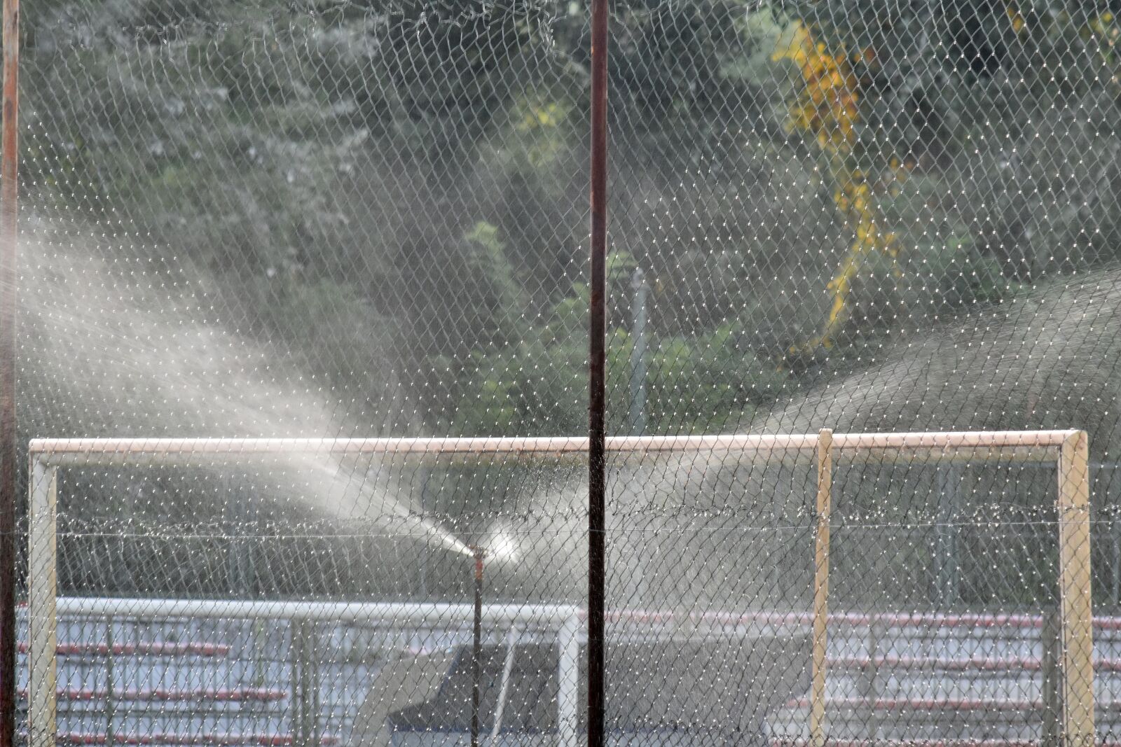 Nikon D5500 sample photo. Field, football, irrigation, barrier photography