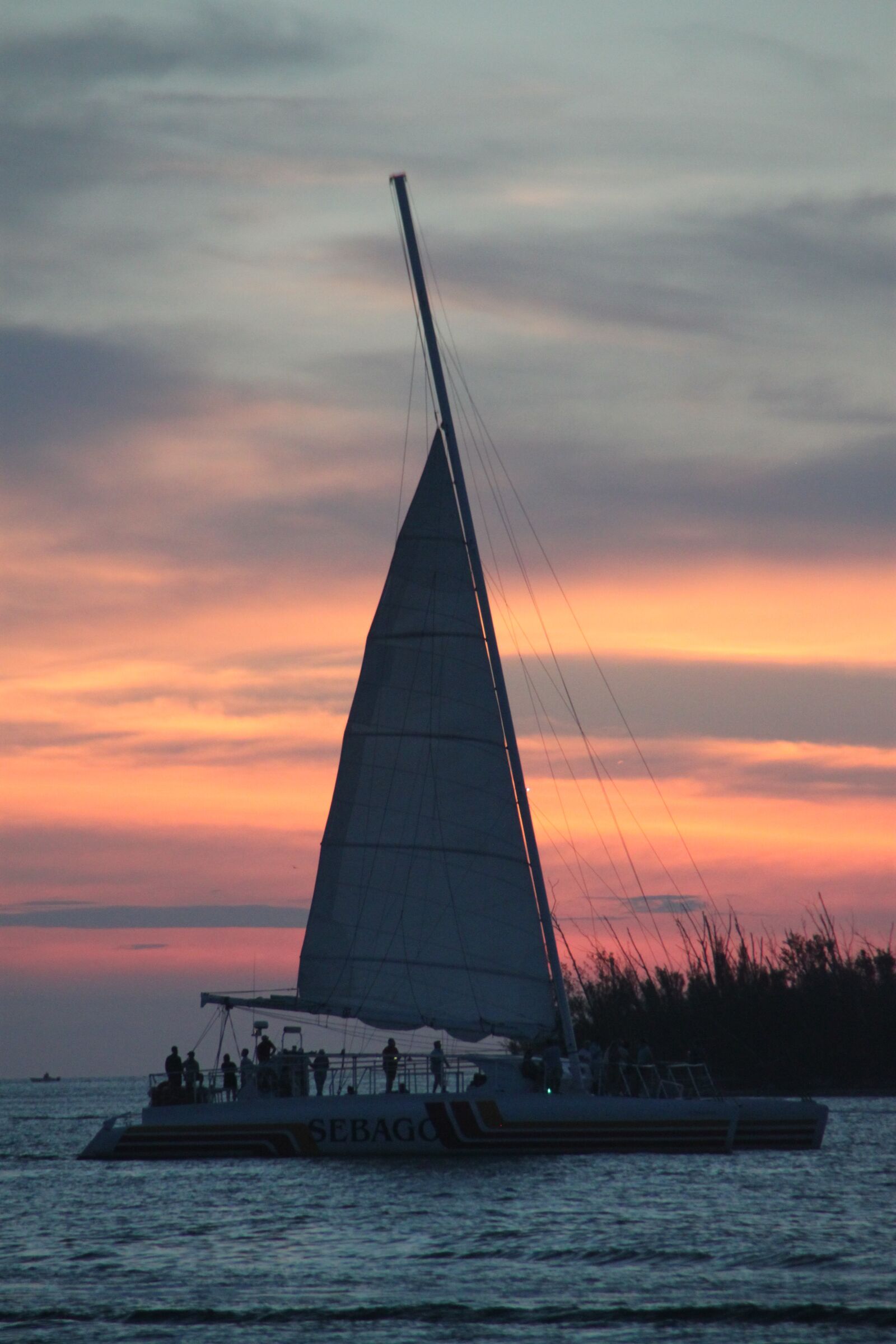 Canon EOS 500D (EOS Rebel T1i / EOS Kiss X3) sample photo. Sunset, boat, key west photography