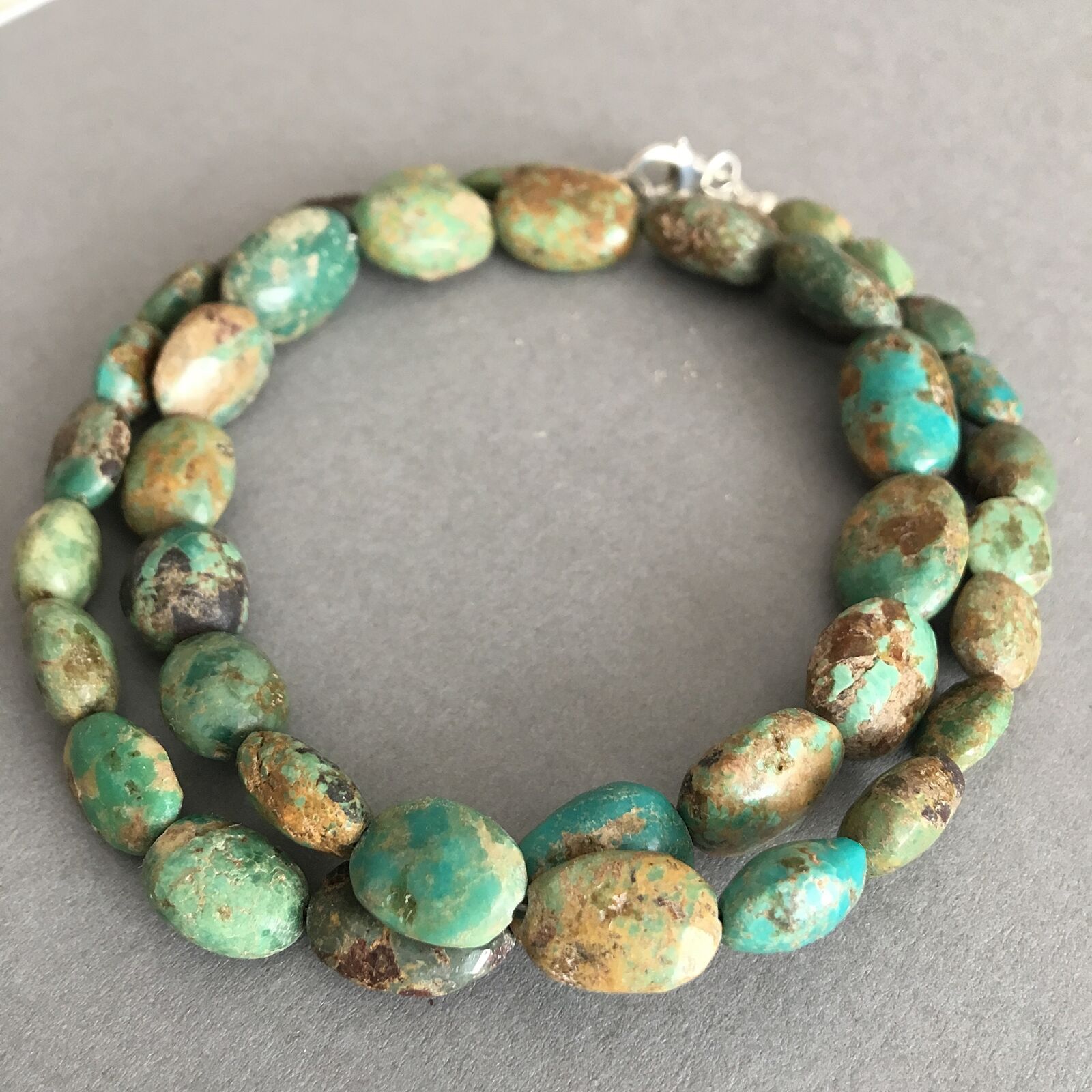 iPhone 6s back camera 4.15mm f/2.2 sample photo. Tourquise necklace, summer, gemstone photography