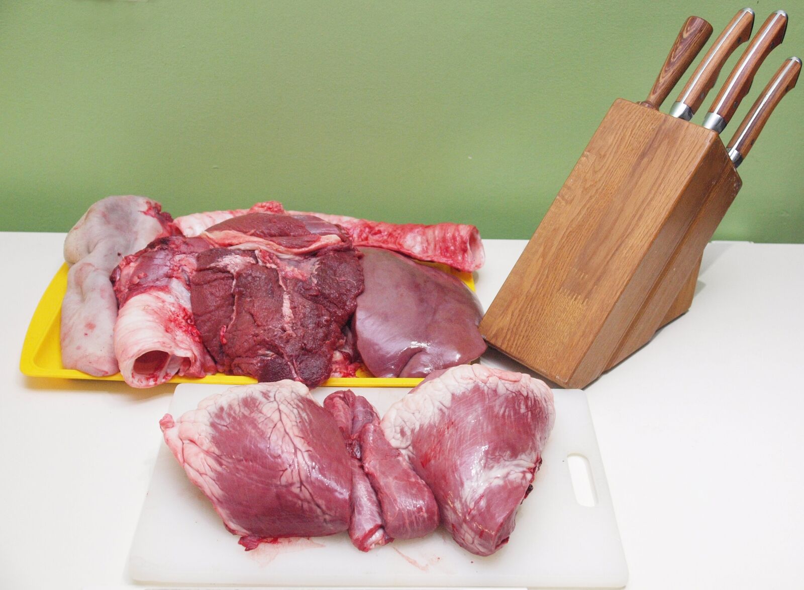 Olympus E-30 sample photo. Meat, knives, knife photography