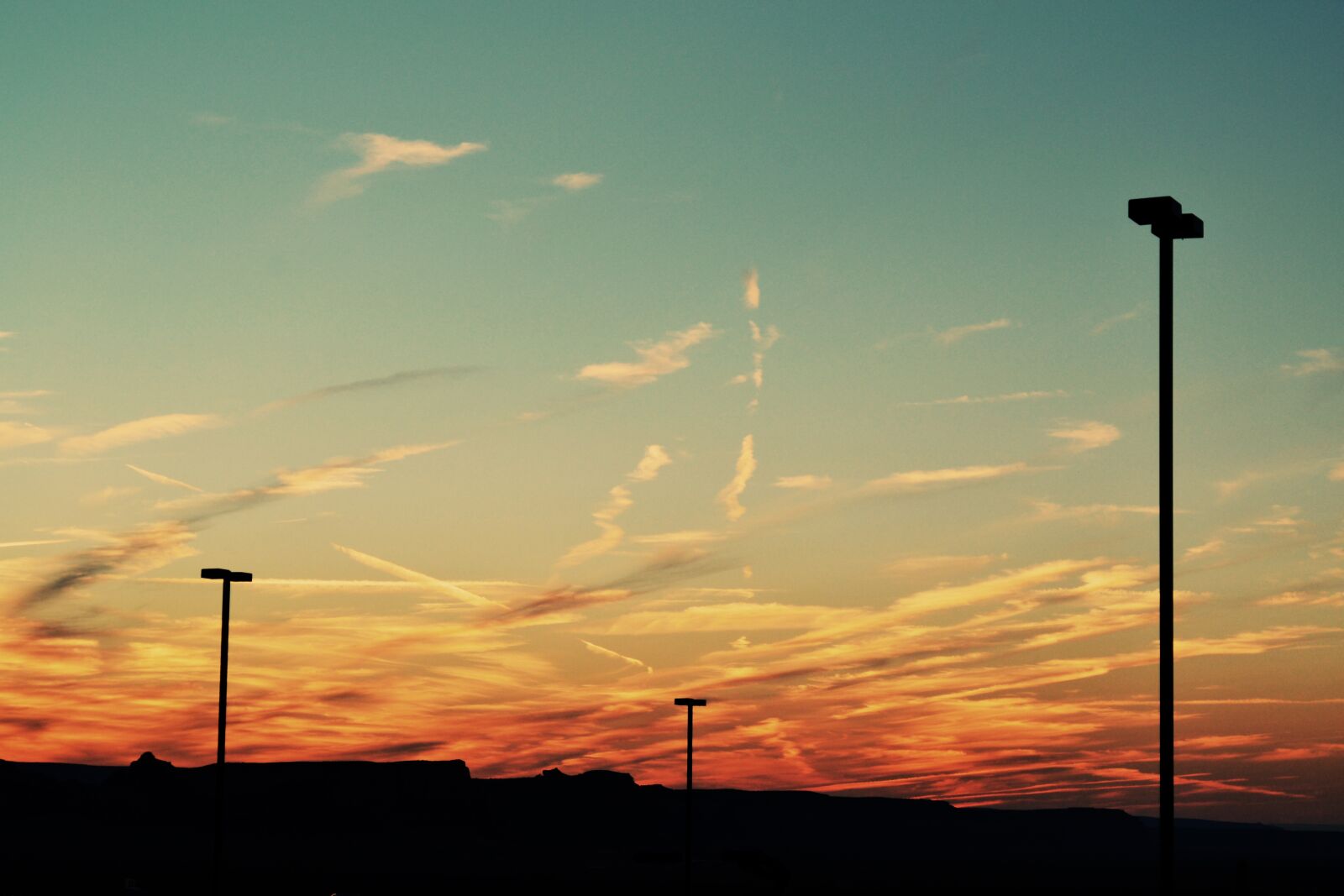 Nikon D3100 sample photo. Sunset, sky, lamp posts photography