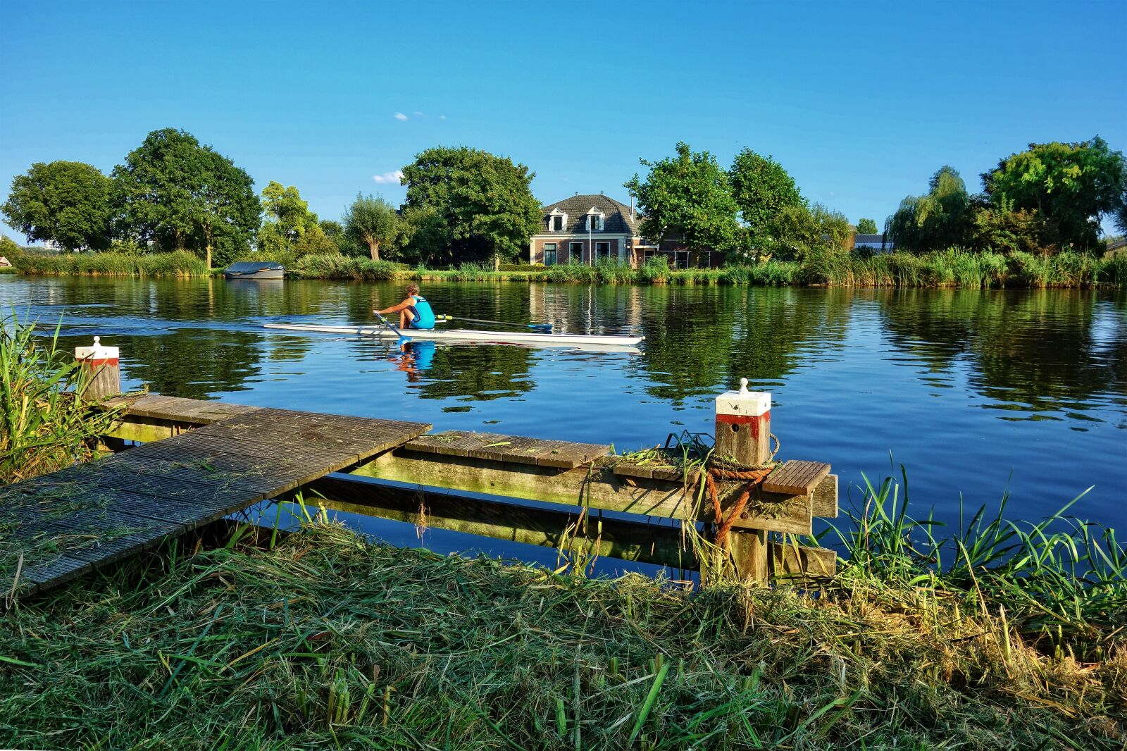 Sony Cyber-shot DSC-RX100 sample photo. Canoe, rower, river photography