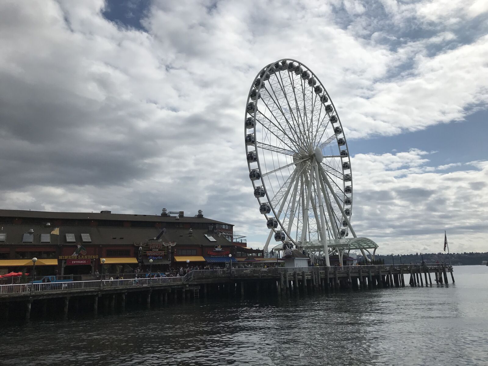 iPhone 7 back camera 3.99mm f/1.8 sample photo. Seattle, shore, wheel photography