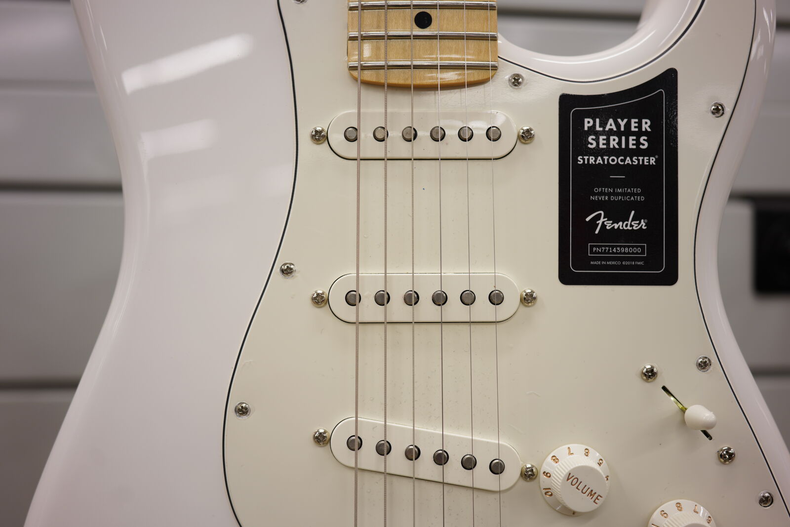 Sony a7R IV sample photo. White fender electric guitar photography