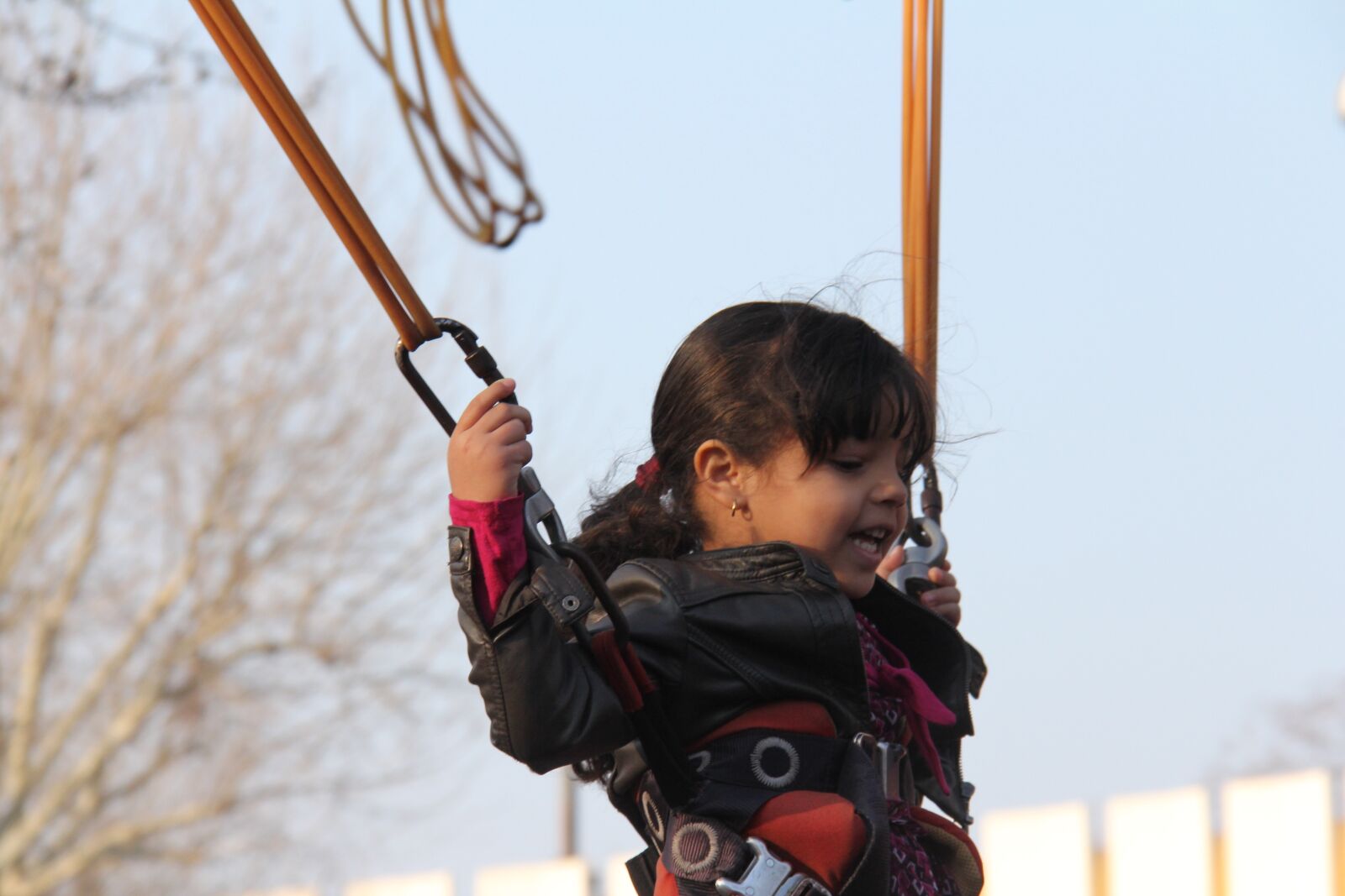 Canon EF-S 18-200mm F3.5-5.6 IS sample photo. Swing, little girl, fun photography