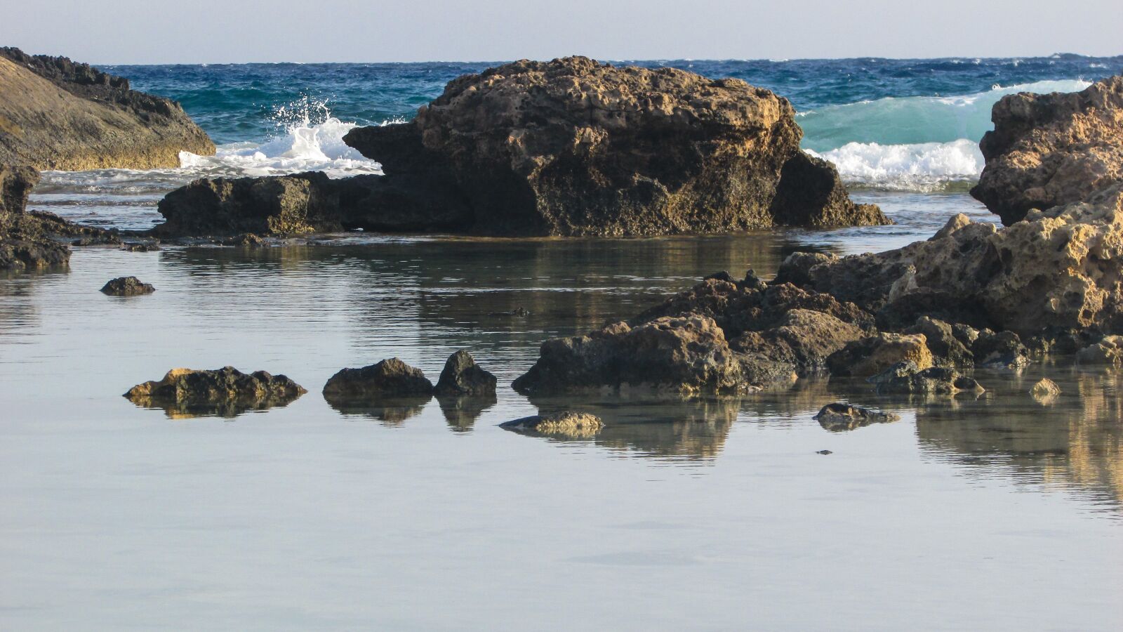 Canon PowerShot SX400 IS sample photo. Lagoon, rocky coast, sea photography