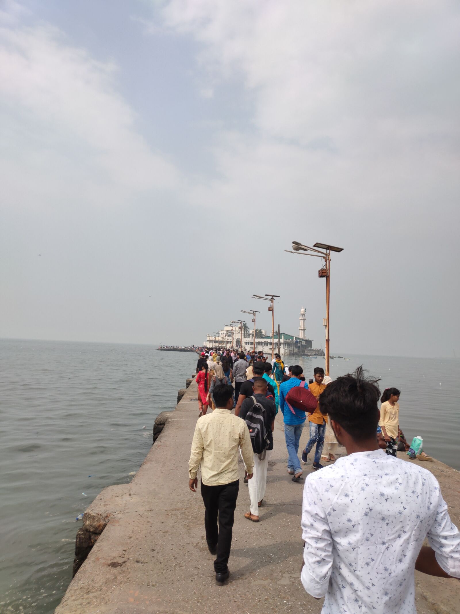 Realme XT sample photo. Haji ali, sea, people photography