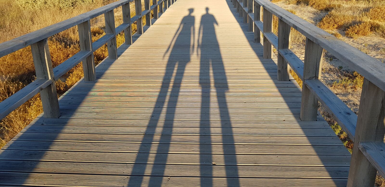 Samsung Galaxy S8 sample photo. Shadow, sunset, barrier photography