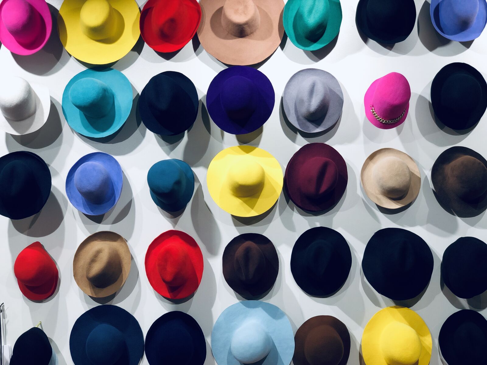 iPhone X back dual camera 6mm f/2.4 sample photo. Finland, hats, shopping photography