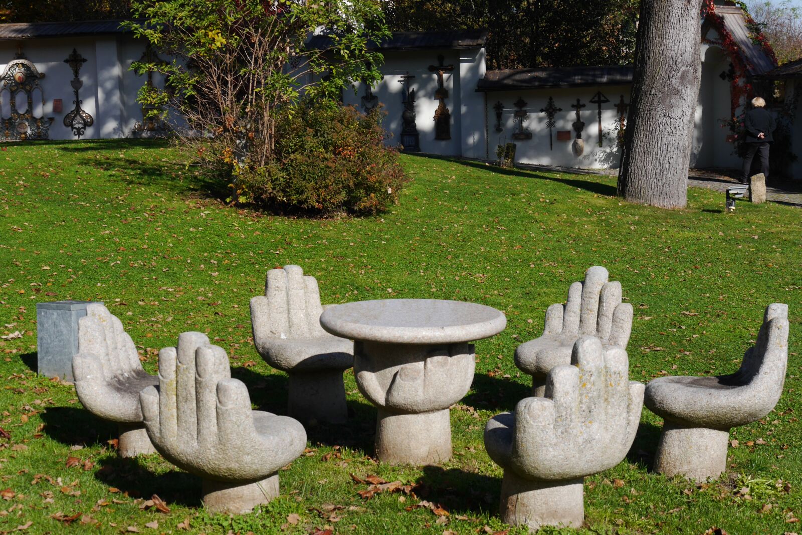 Panasonic Lumix DMC-G6 sample photo. Seating arrangement, stone, hands photography