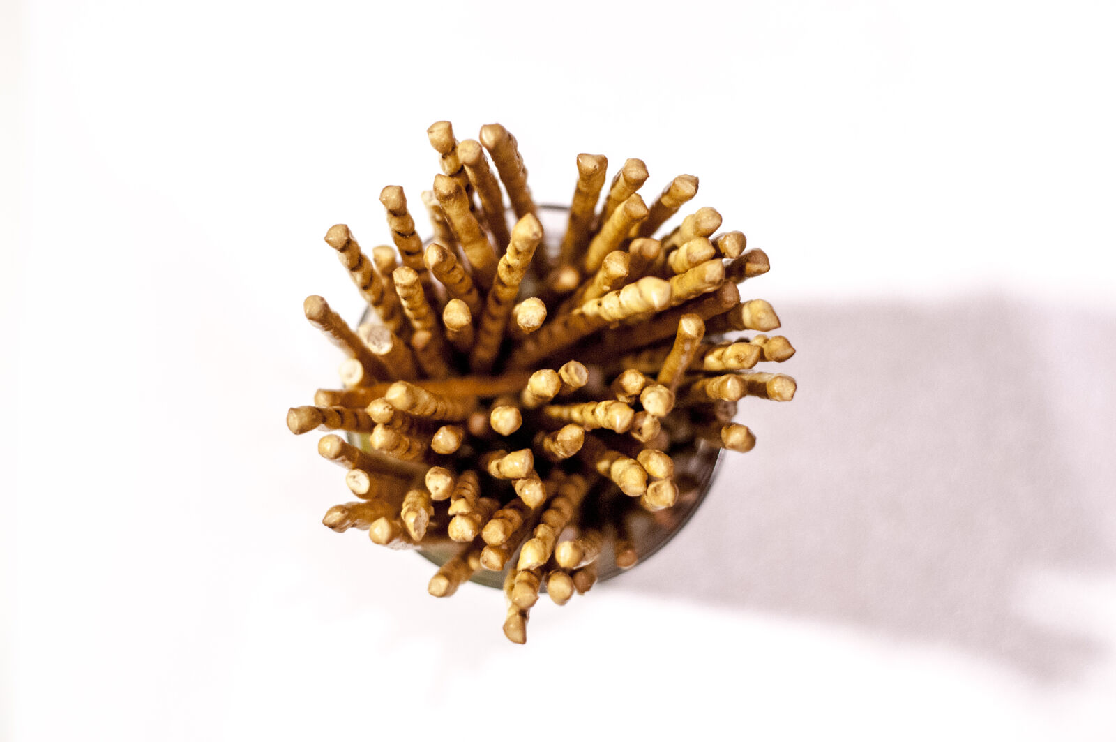 Nikon AF Nikkor 50mm F1.8D sample photo. Pretzels, stick, on, glass photography