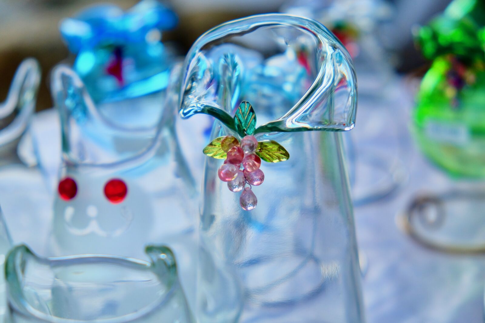 Fujifilm X-T10 sample photo. Crystal, grass work, bottle photography