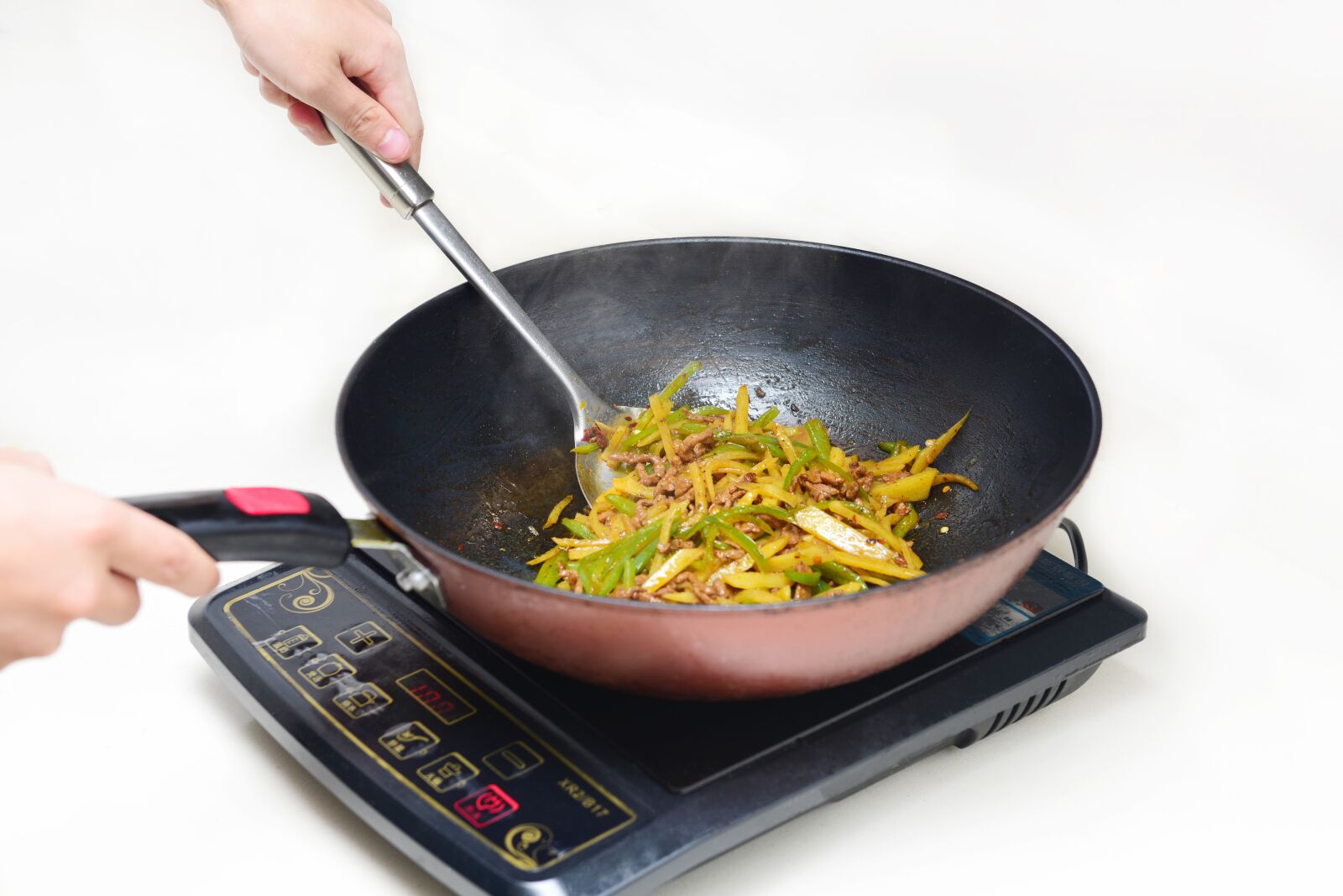 Nikon D810 sample photo. Cook, shredded potato, induction photography