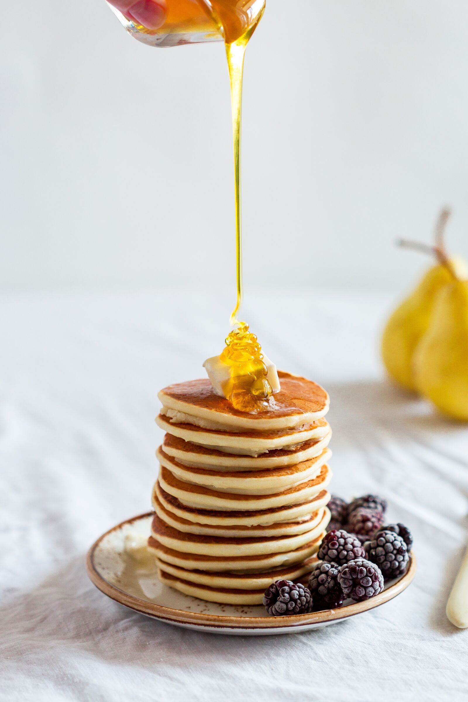 Canon EF 100mm F2.8 Macro USM sample photo. Pancakes, honey, breakfast photography