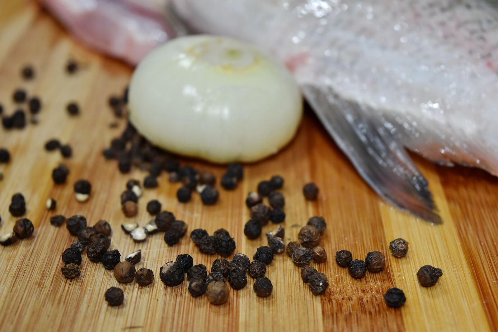 Nikon D5500 sample photo. Fish, onion, pepper, raw photography