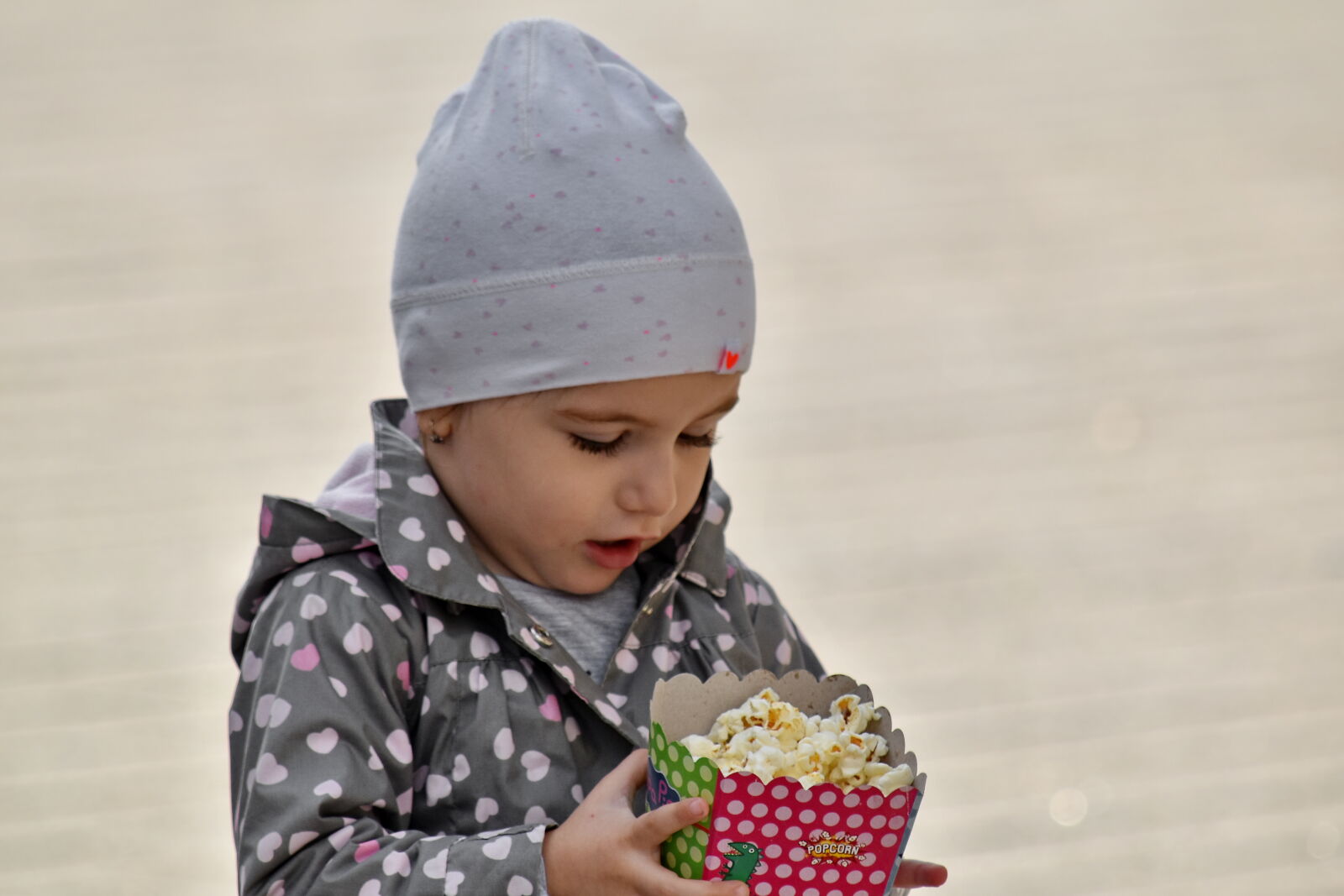 Nikon D5500 sample photo. Child, happiness, popcorn, hat photography