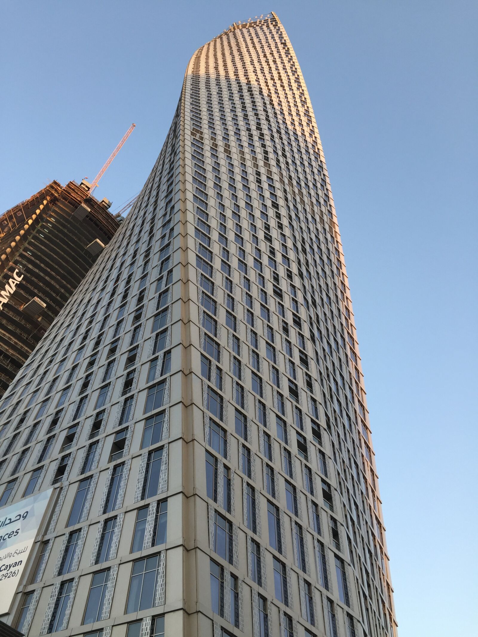 iPhone 6 back camera 4.15mm f/2.2 sample photo. Dubai, skyscraper, leaning tower photography