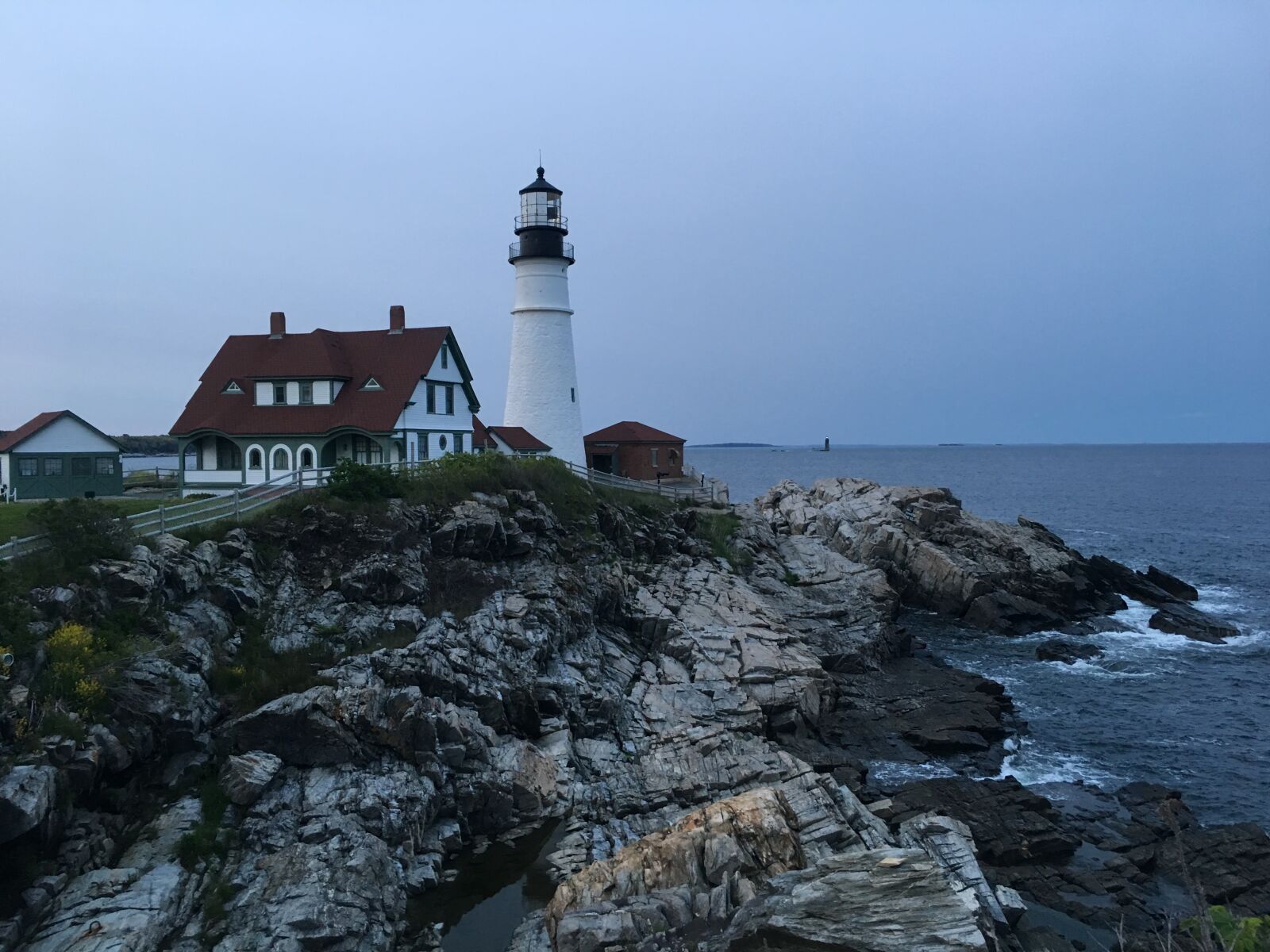 Apple iPhone 6s sample photo. Lighthouse, rocky shoreline, sea photography