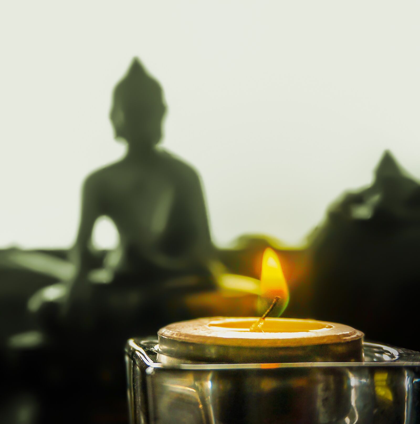Sony Alpha NEX-5T sample photo. Candle, buddha statue, religion photography