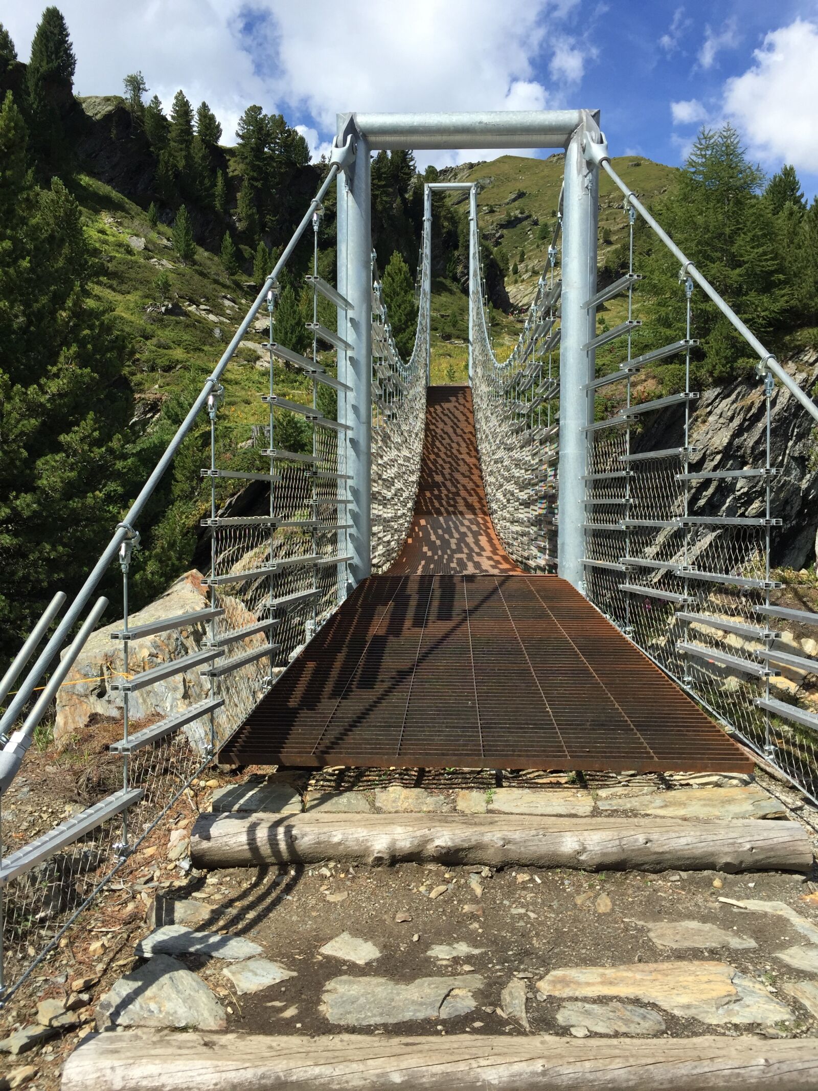 Apple iPhone 6 sample photo. Suspension bridge, bridge, building photography