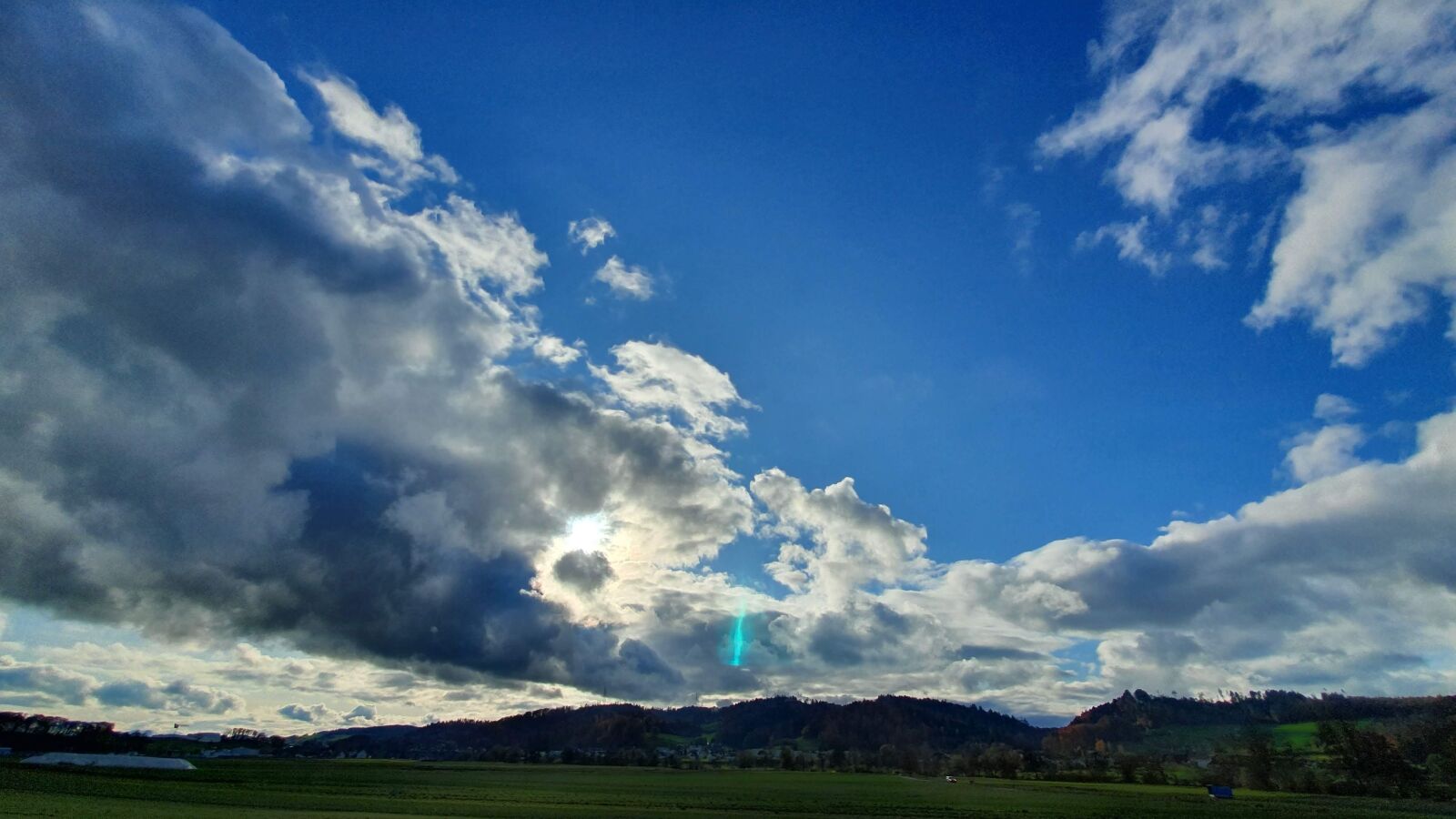 Samsung Galaxy S10+ sample photo. Sun, clouds, blue photography