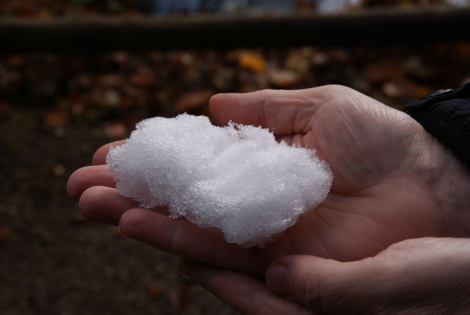 Sony Alpha DSLR-A300 sample photo. Snow, water, hand photography