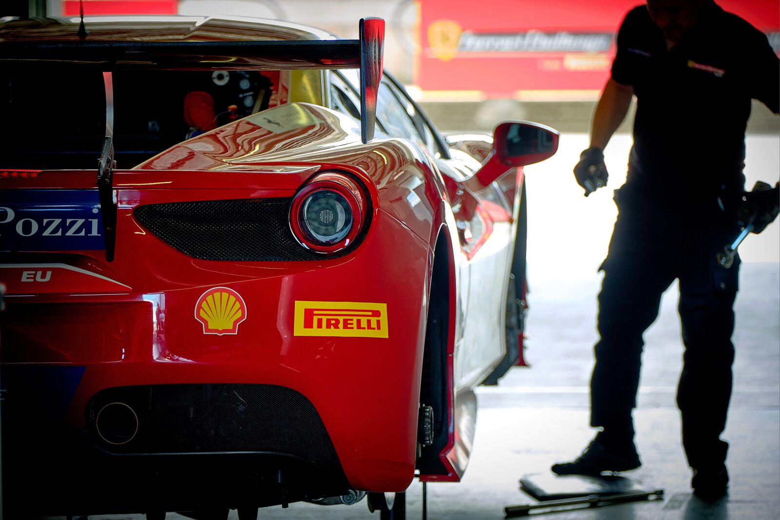Fujifilm X-T2 sample photo. Racing car, garage, repair photography