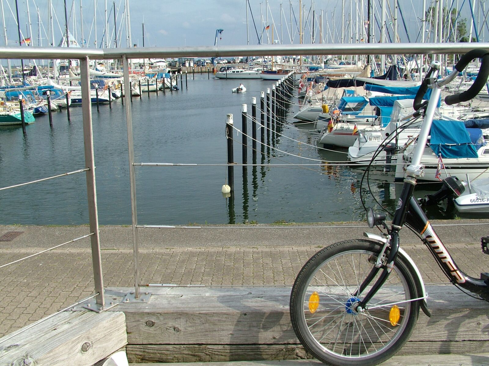 Fujifilm FinePix S7000 sample photo. Port, baltic sea, bike photography