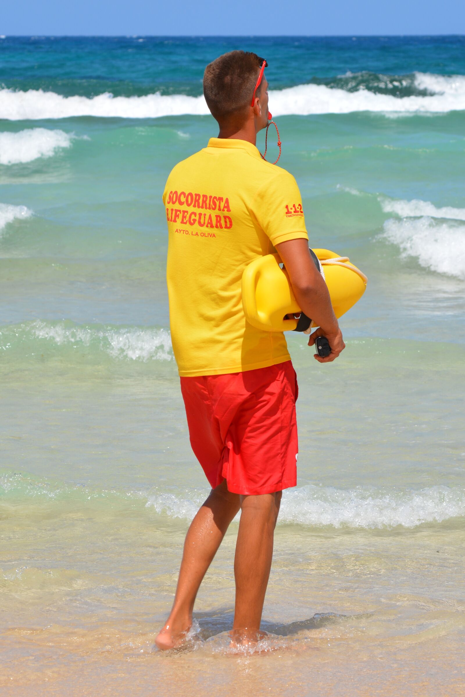 Nikon D5200 sample photo. Rescuer, sea, people photography