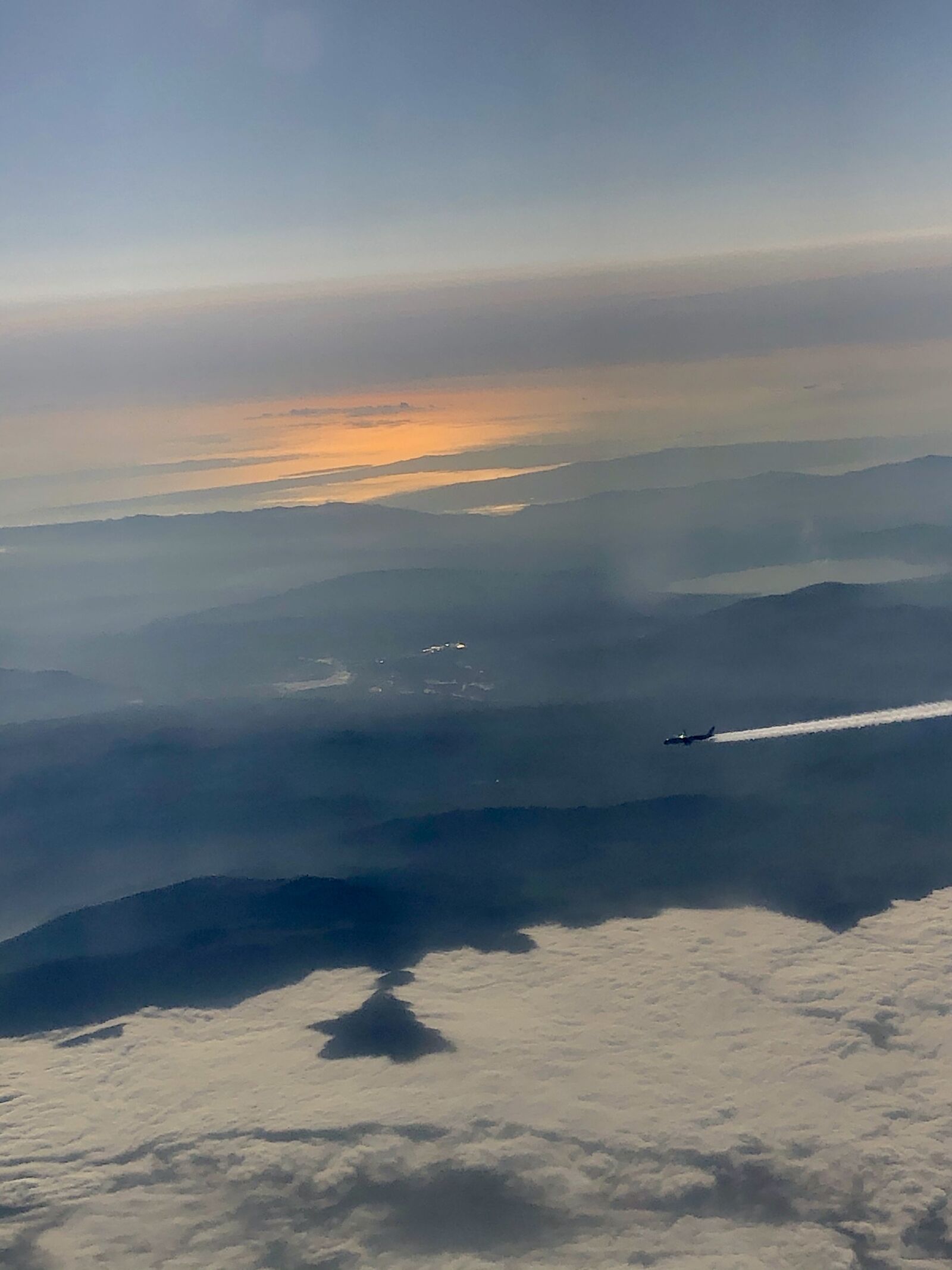 iPhone 8 back camera 3.99mm f/1.8 sample photo. Not alone, sky, plane photography