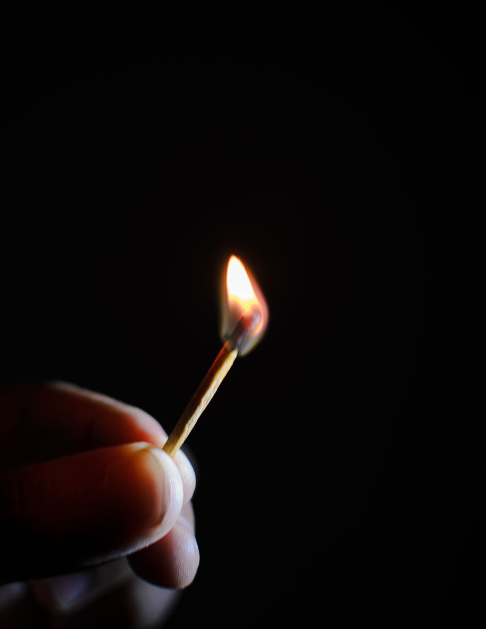 Nikon D5100 + Nikon AF-S DX Nikkor 35mm F1.8G sample photo. Dark, fire, hand, light photography