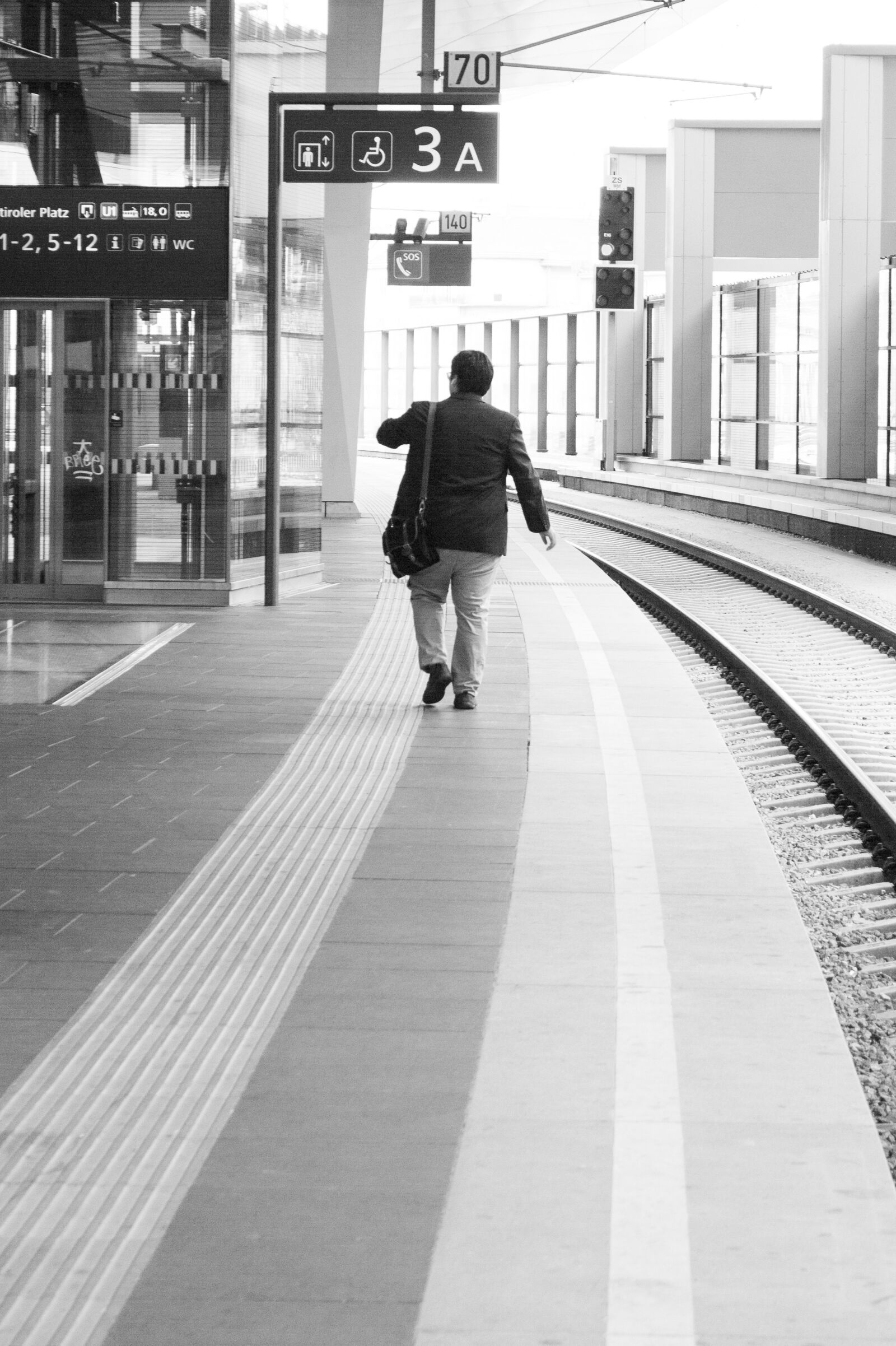 Canon EF-S 18-55mm F3.5-5.6 IS sample photo. Platform, rail, train photography