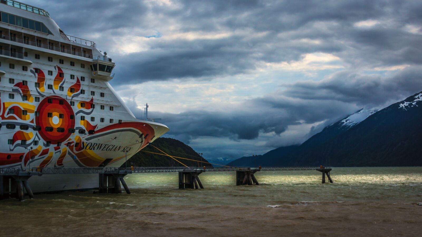 Sony SLT-A77 sample photo. Piers, clouds, pacific photography