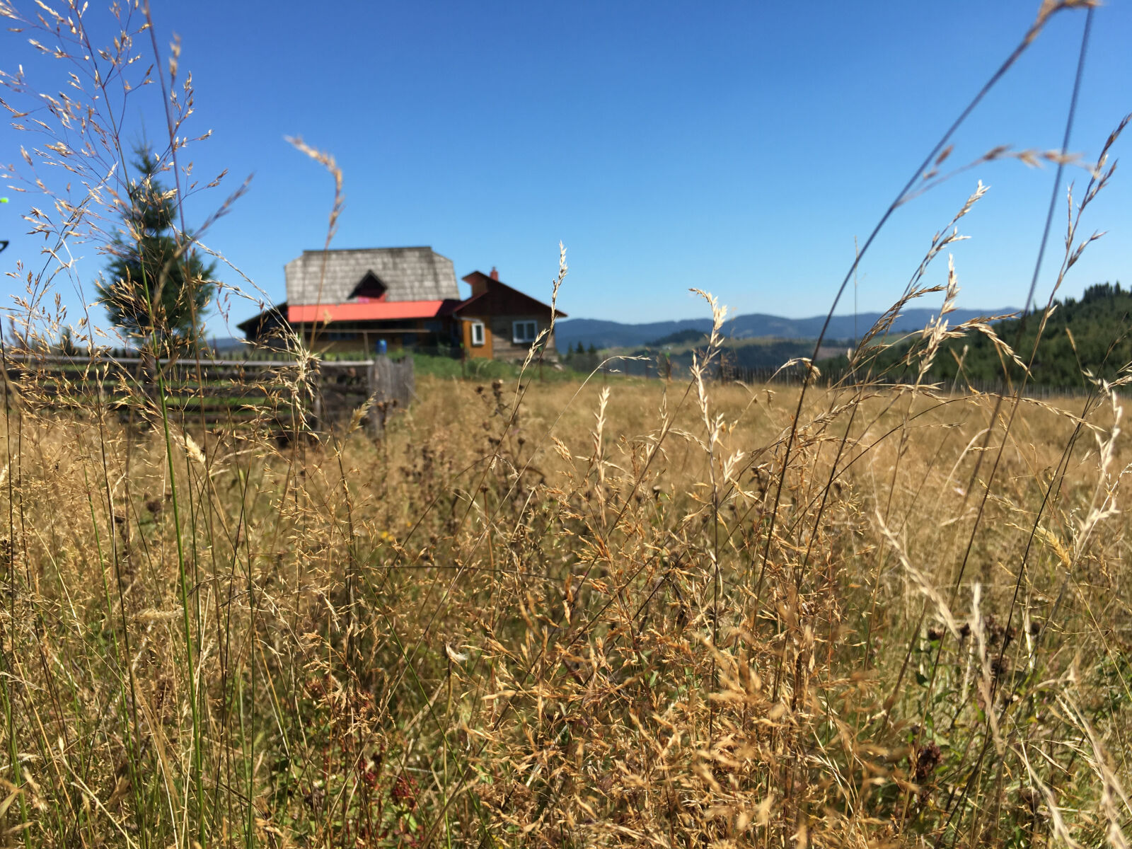 Apple iPhone 6s sample photo. Mountain, old, hut photography