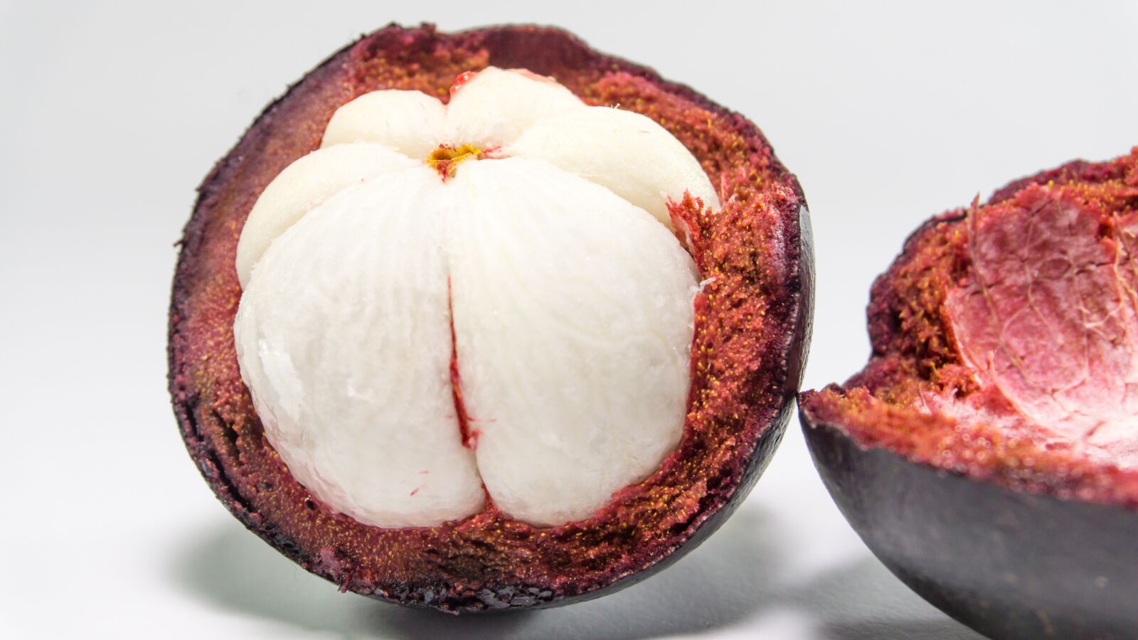 Sony a5100 sample photo. Mangosteen, fruit, hold photography