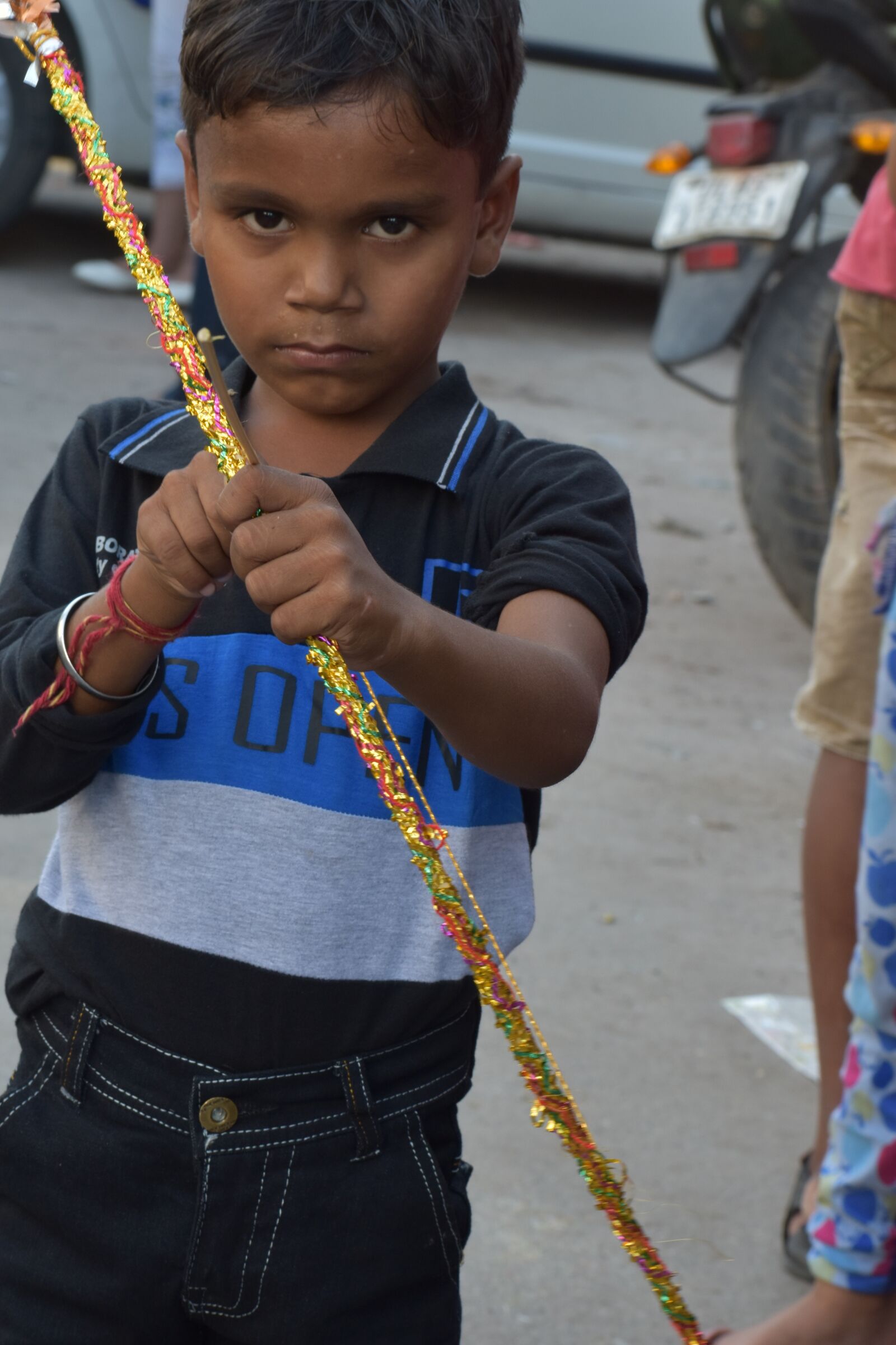 Nikon D5600 sample photo. Indian boy, serious and photography