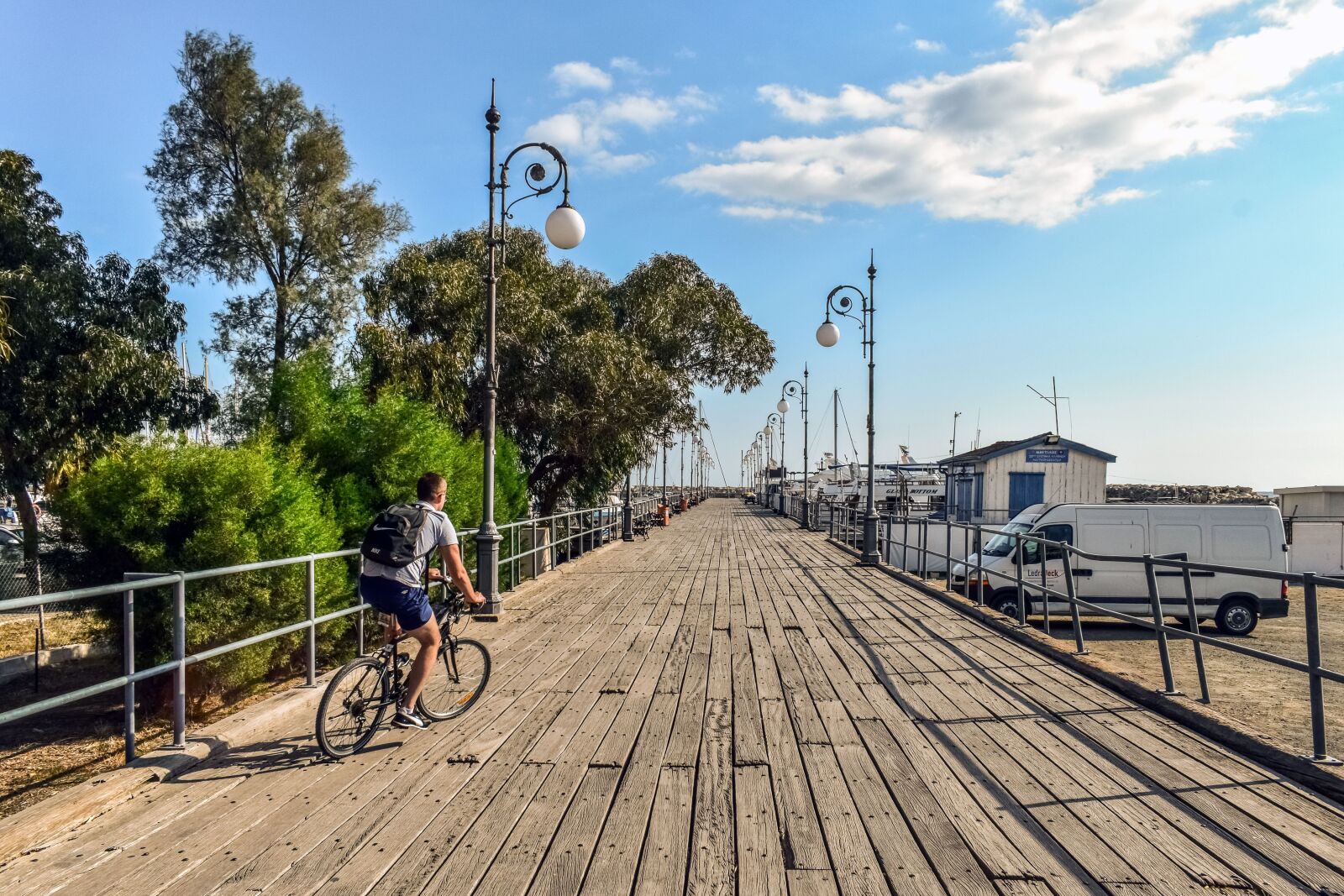 Nikon D3300 sample photo. Biker, pier, marina photography