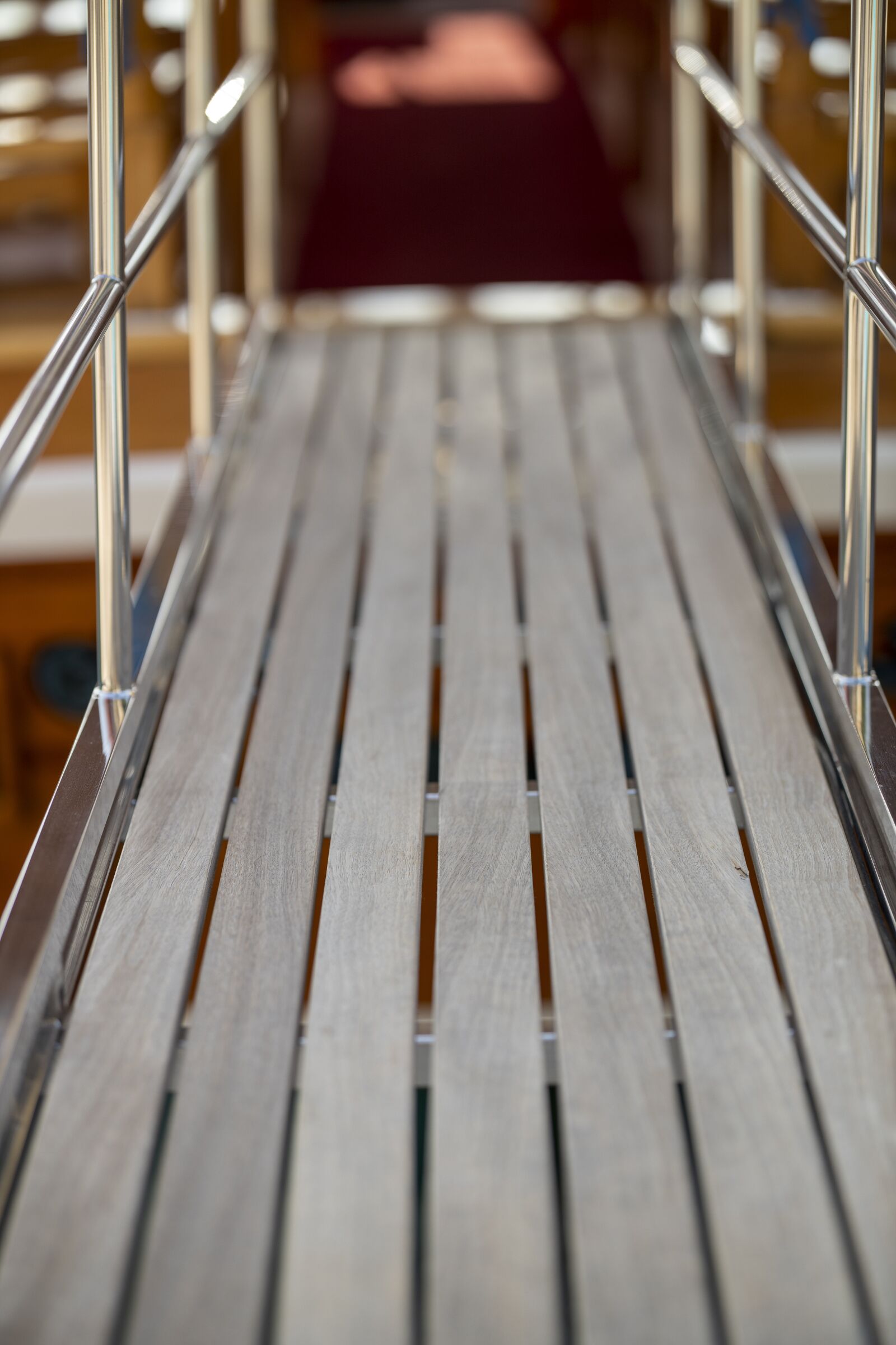 Canon RF 85mm F1.2L USM sample photo. Wood-fibre boards, bridge, boots photography