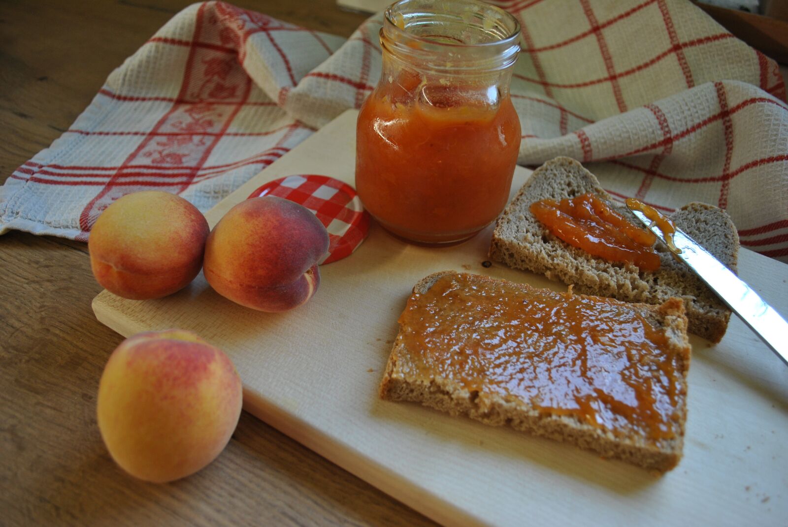 Nikon D3000 sample photo. Peach, jam, food photography