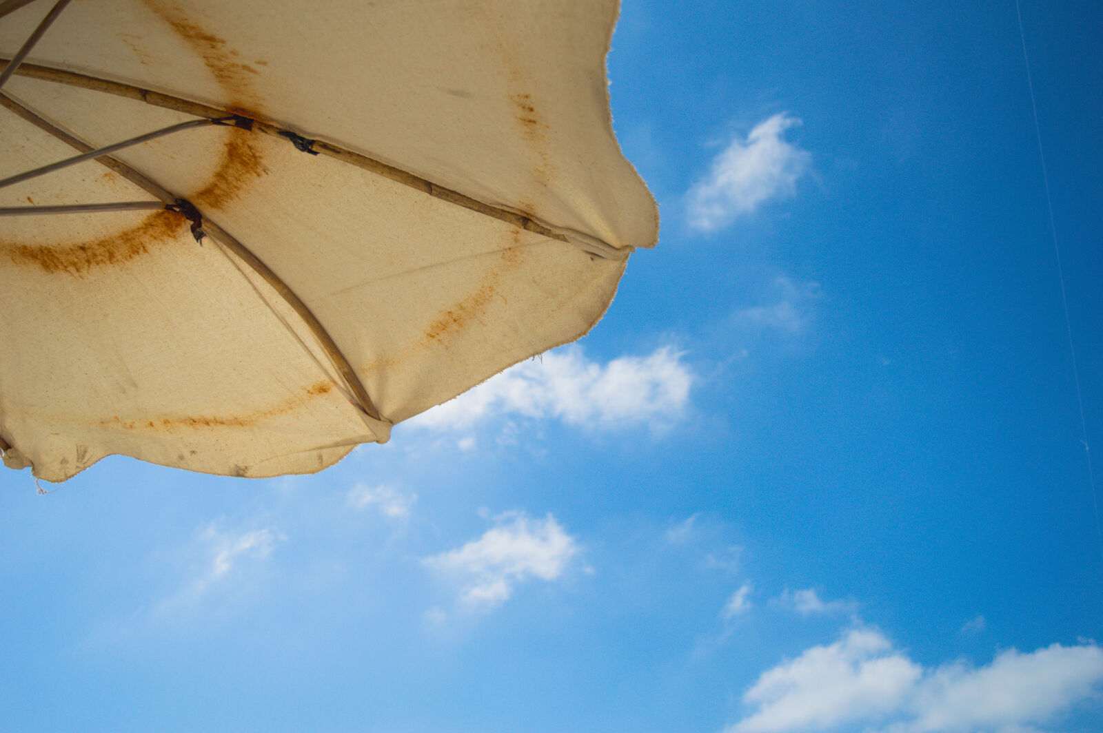 Nikon D3200 sample photo. Awesome, beach, blue, clouds photography