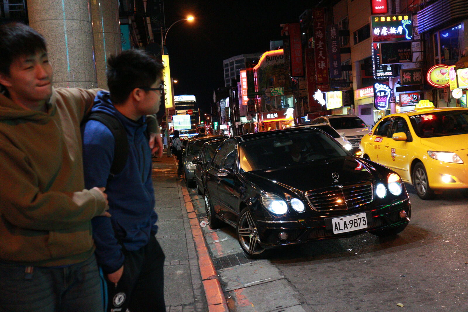 Canon EOS M sample photo. Men, standing, on, city photography