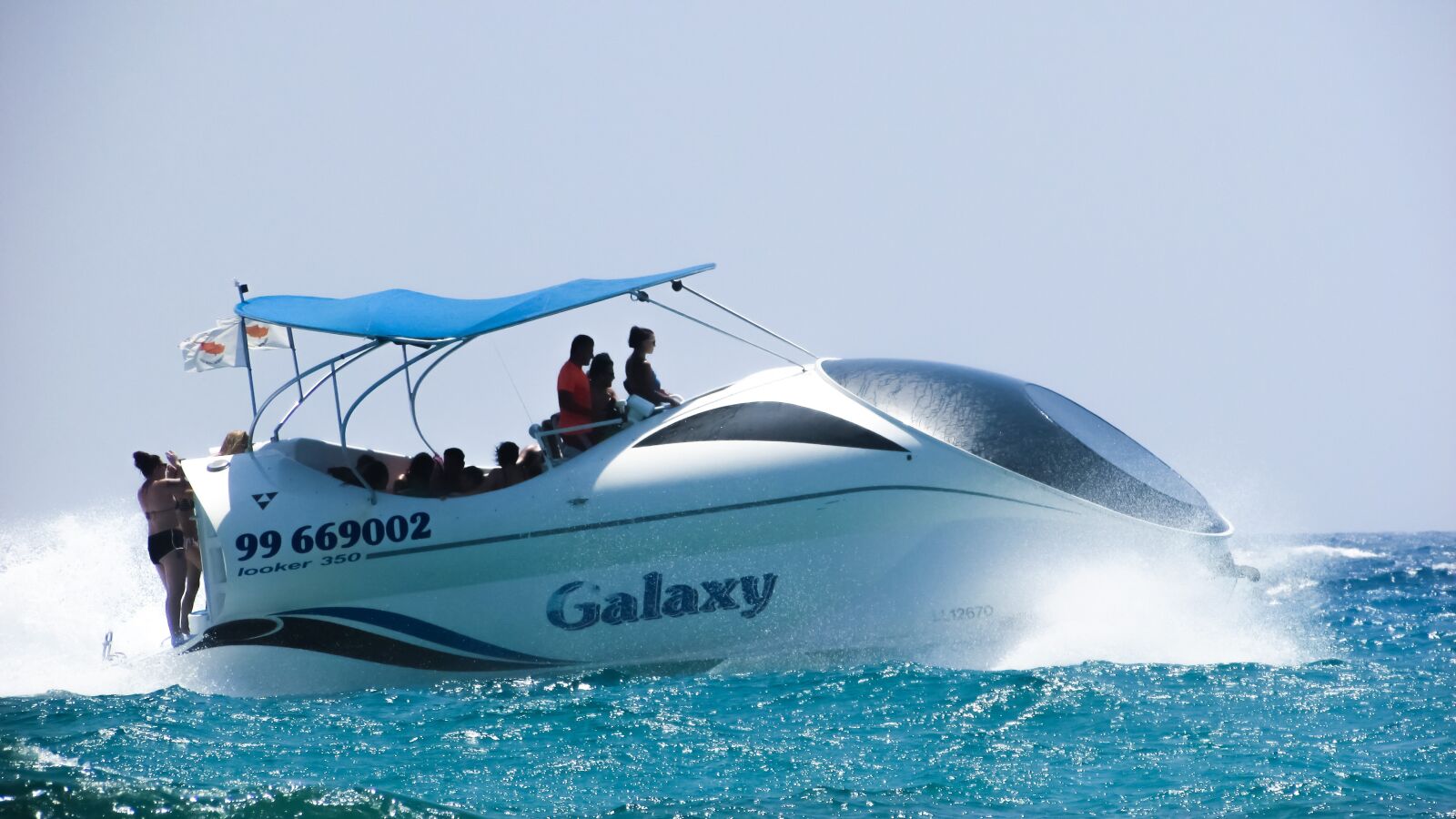 Canon PowerShot SX400 IS sample photo. Speed boat, cruise boat photography