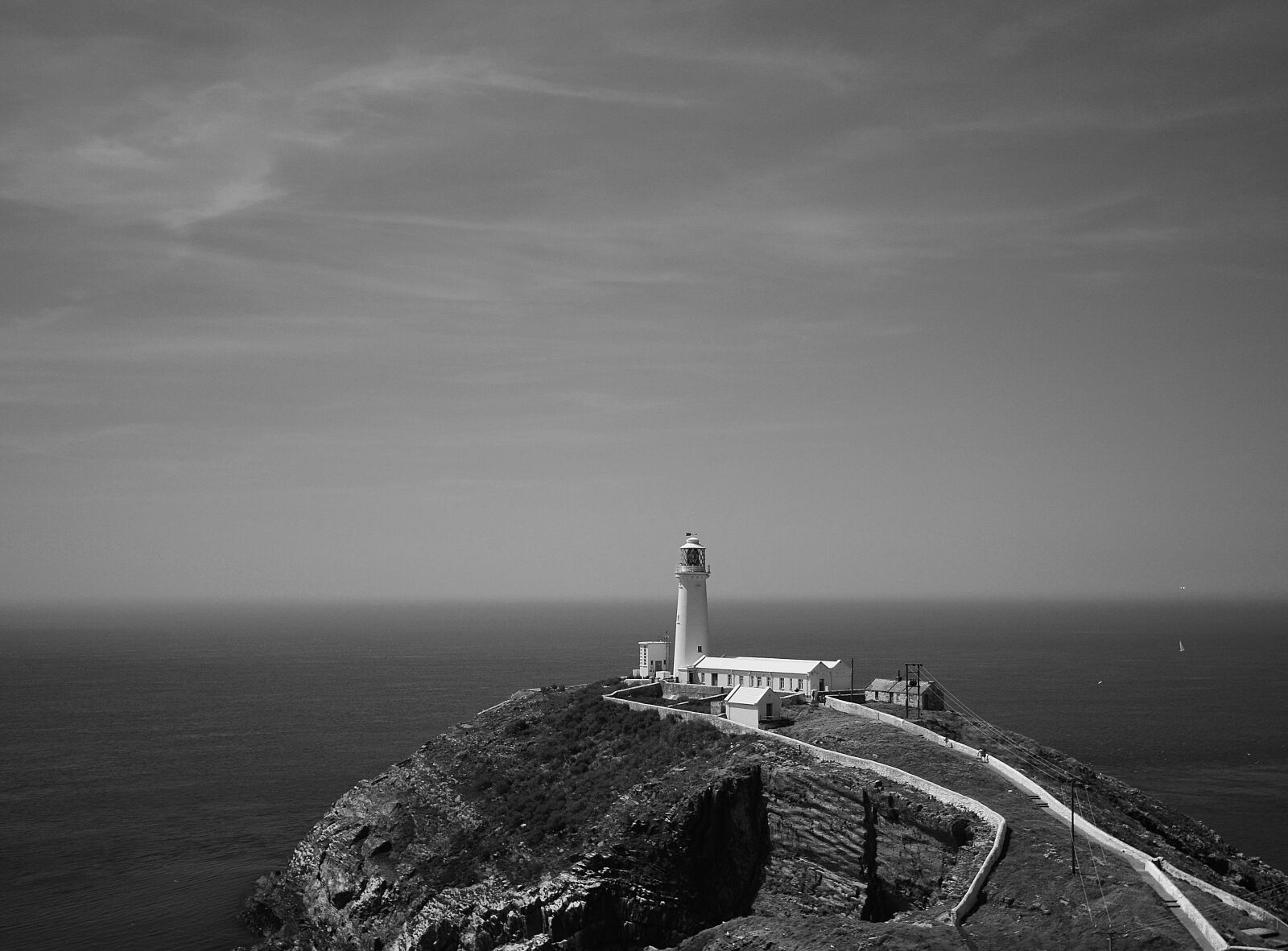 Nikon D7000 sample photo. Lighthouse, cliffs, sea photography