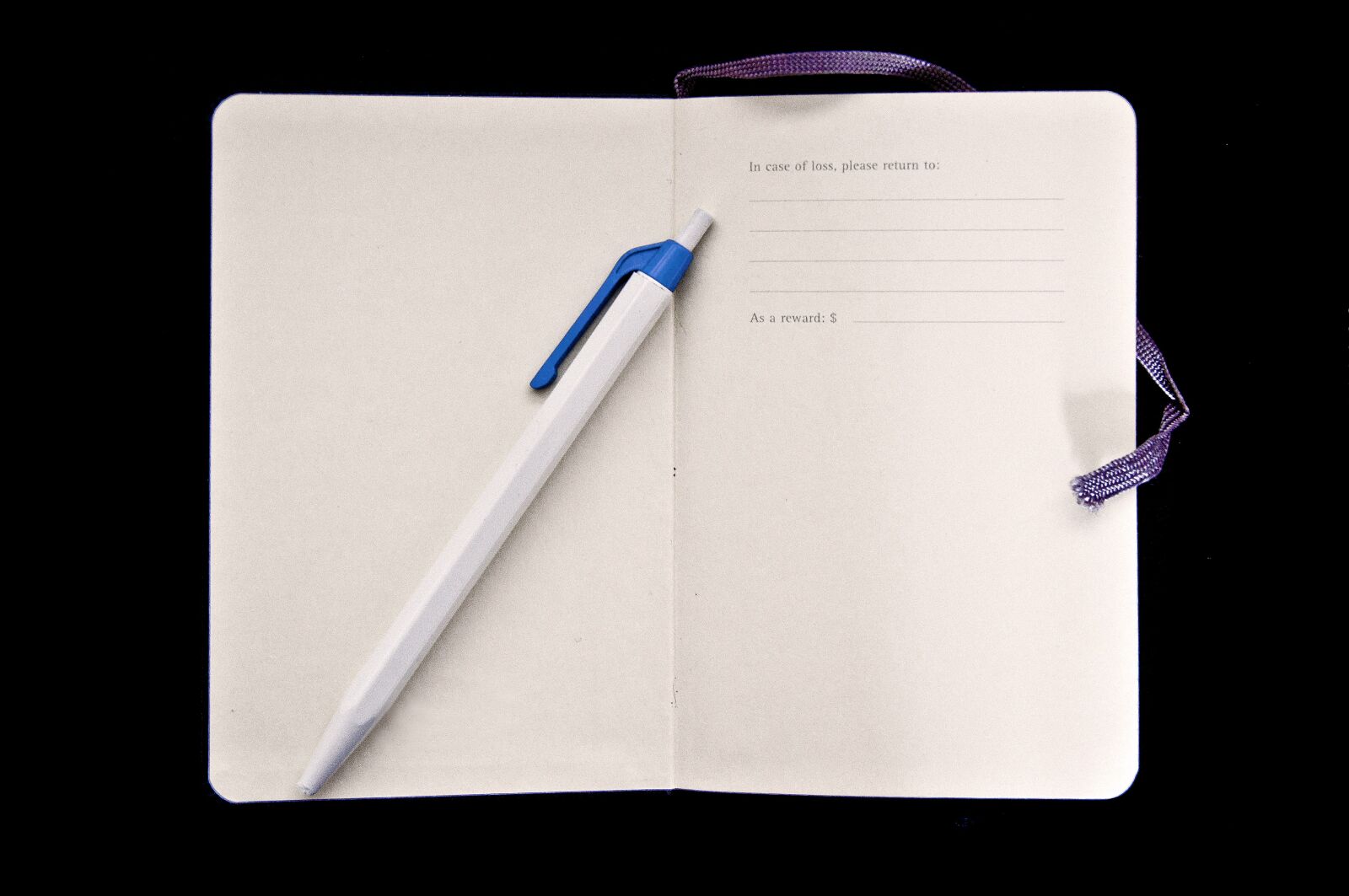 Nikon D90 sample photo. Agenda, pen, finder's fee photography