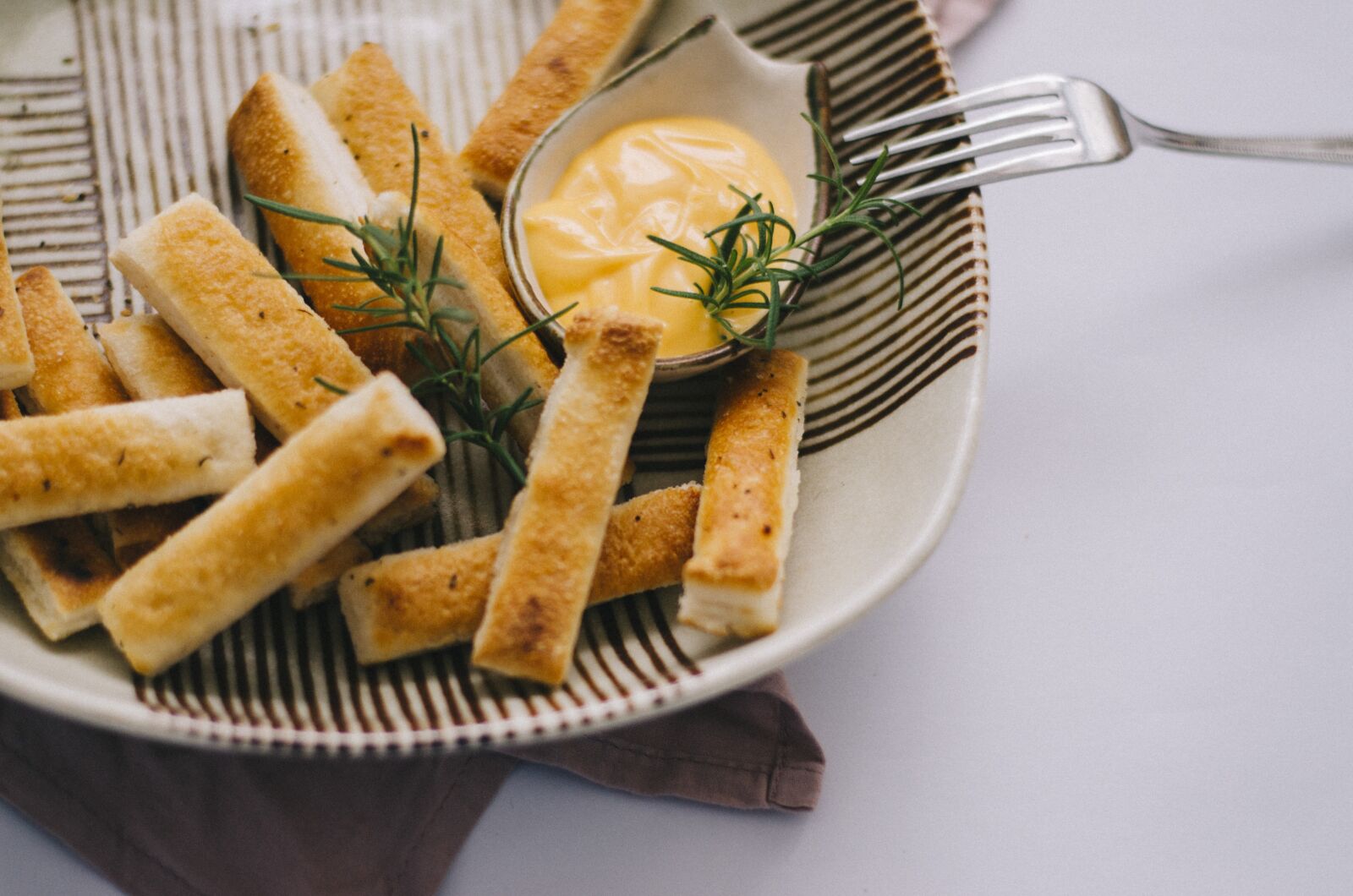 Nikon D7000 sample photo. Stick, bread, thyme photography